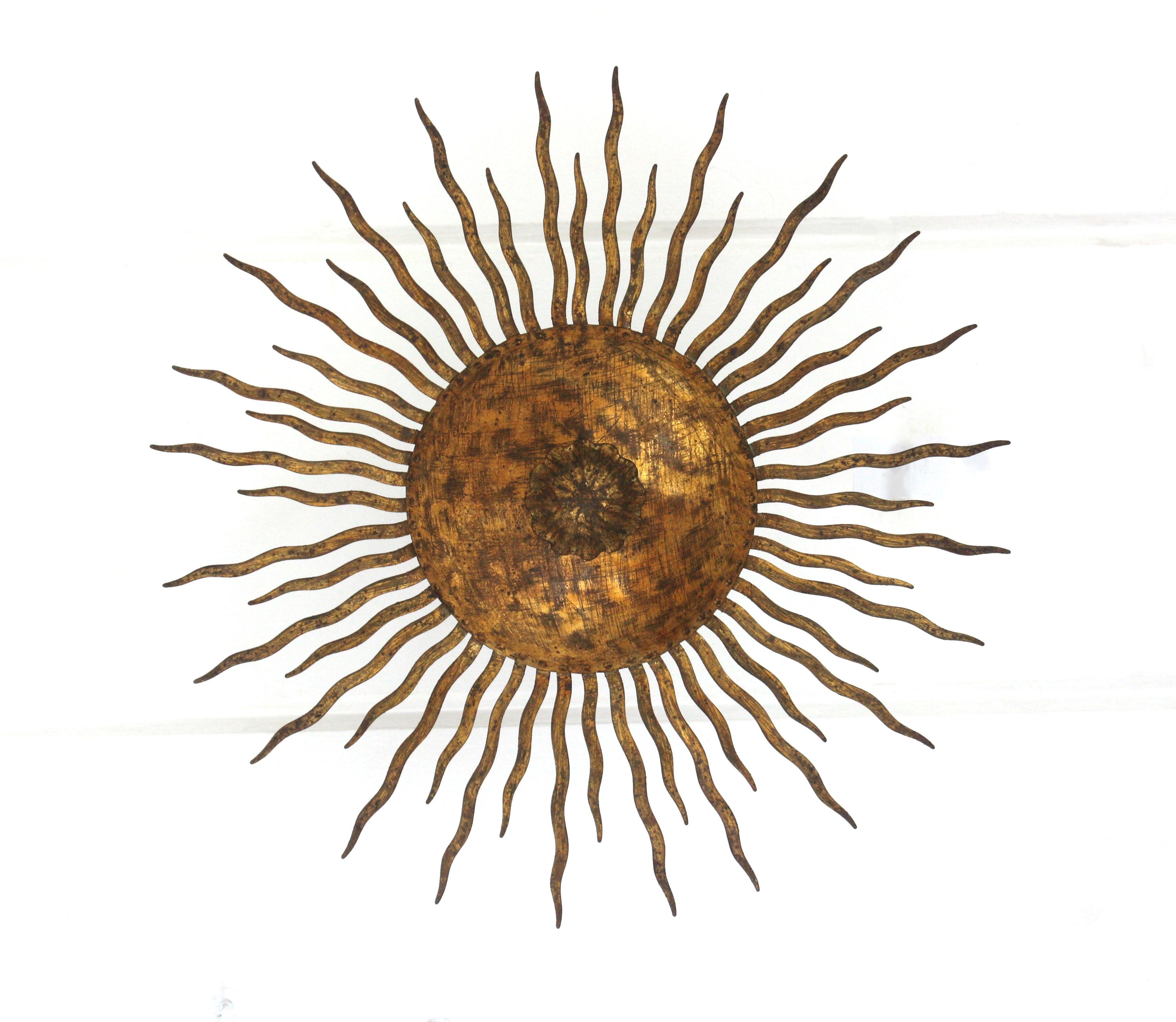 Sunburst Ceiling Light Fixture or Chandelier with Curly Rays, Gilt Iron For Sale 1