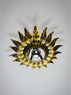 Sunburst ceiling light fixture or sconce in Gilt Wrought Iron, Spain, Circa 1960