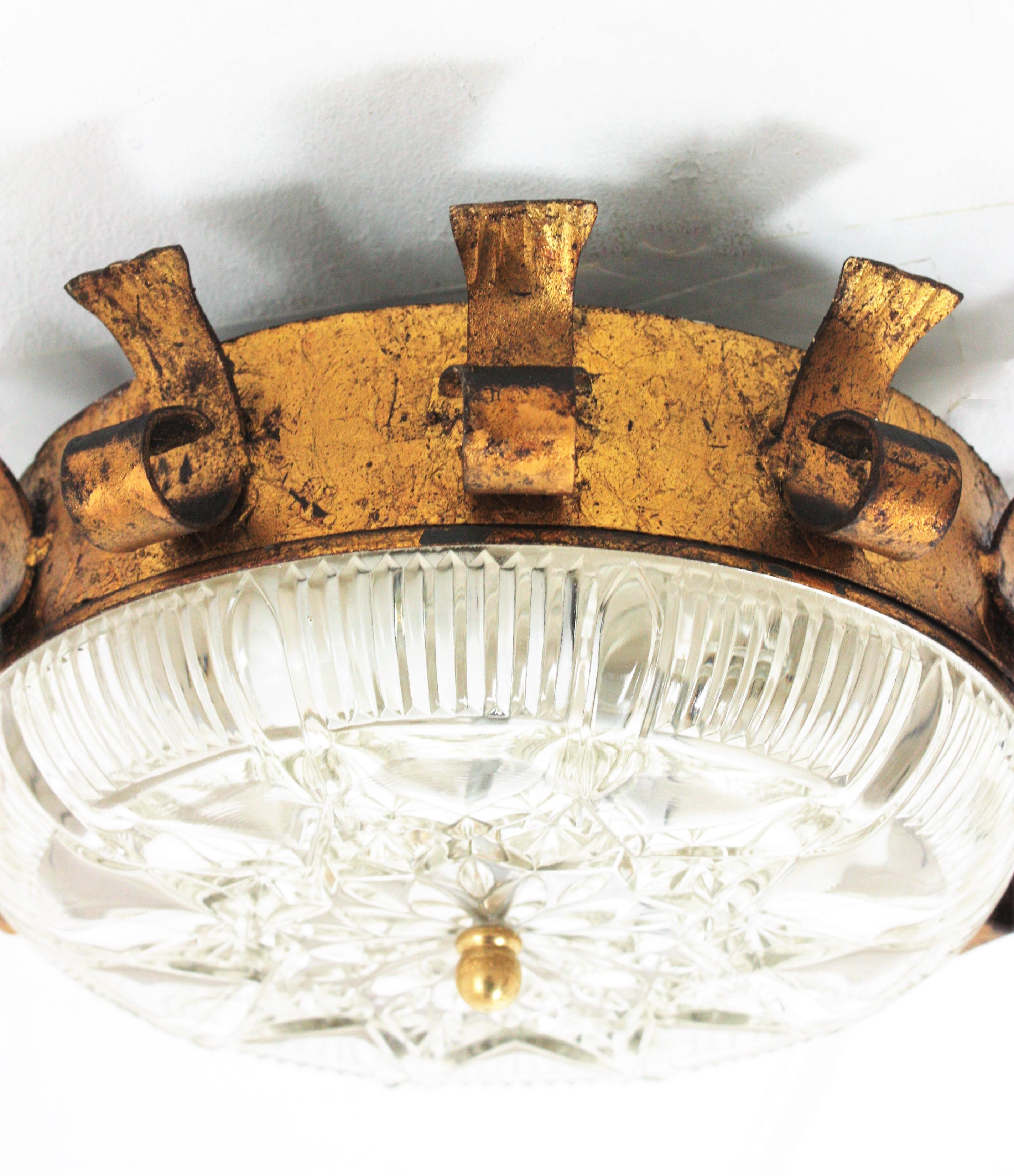 Spanish Sunburst Crown Light Fixture in Gilt Iron and Pressed Glass For Sale