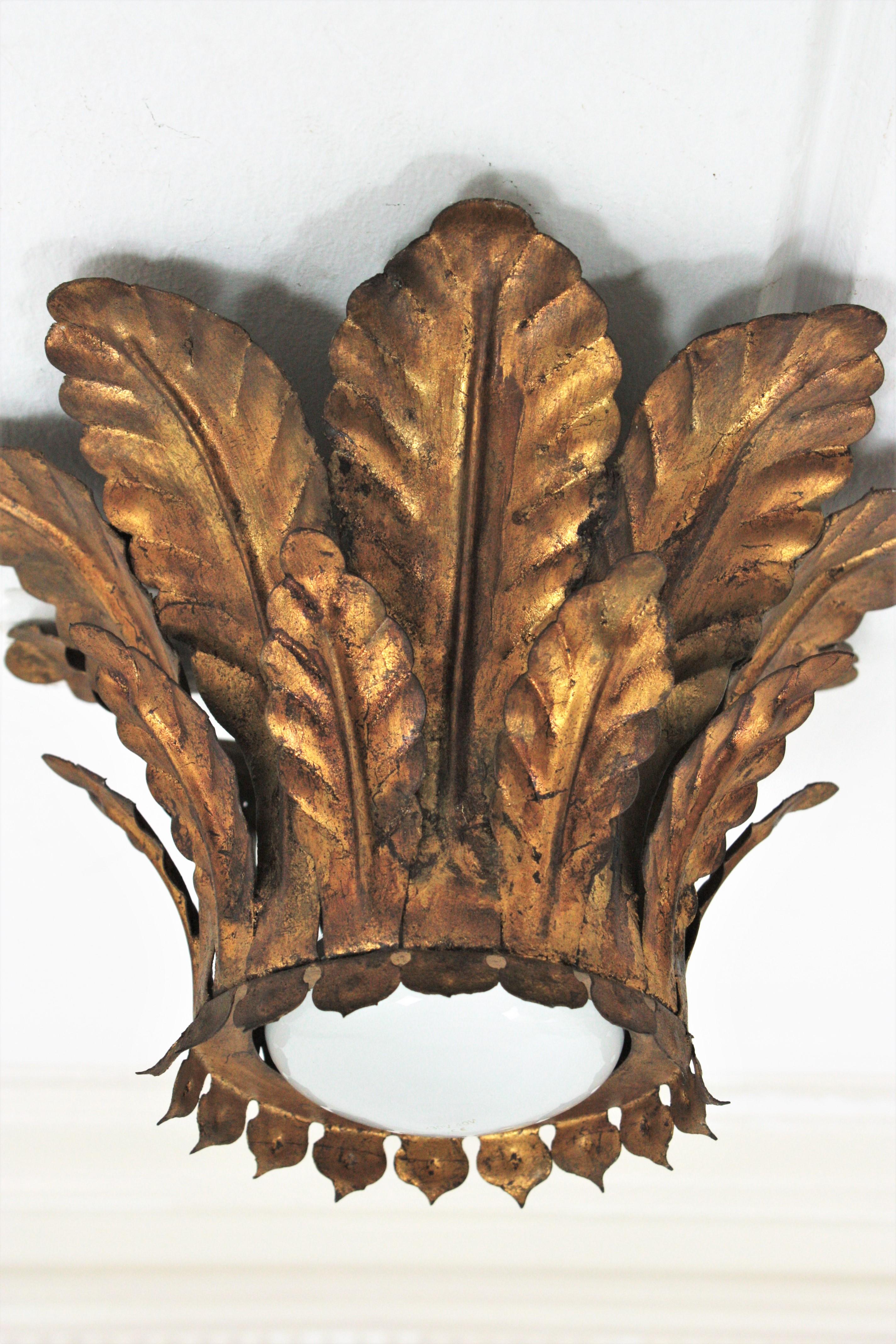 Hammered Sunburst Crown Foliage Flush Mount in Gilt Iron For Sale
