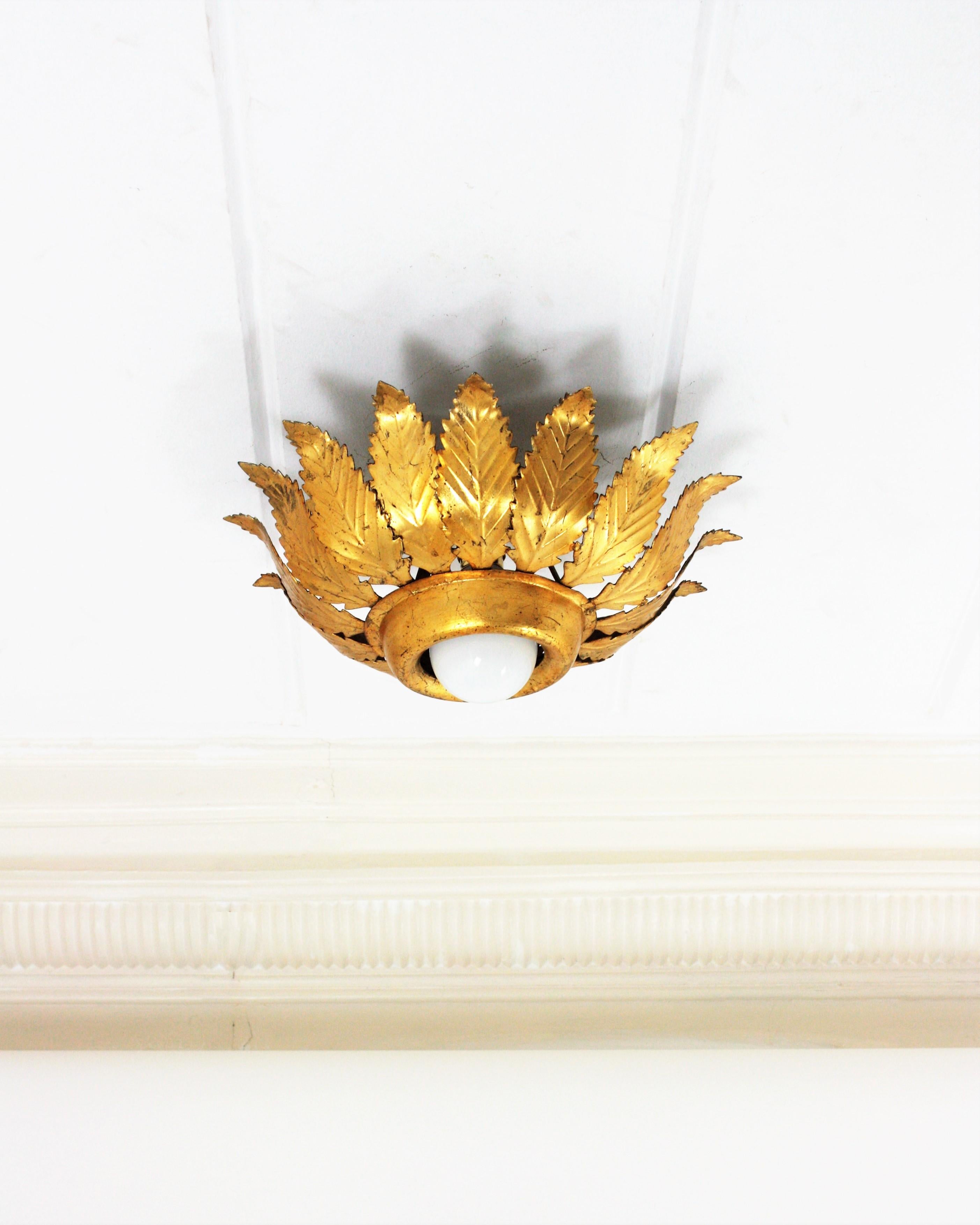 Hollywood Regency Sunburst Crown Leafed Light Fixture in Gilt Iron For Sale