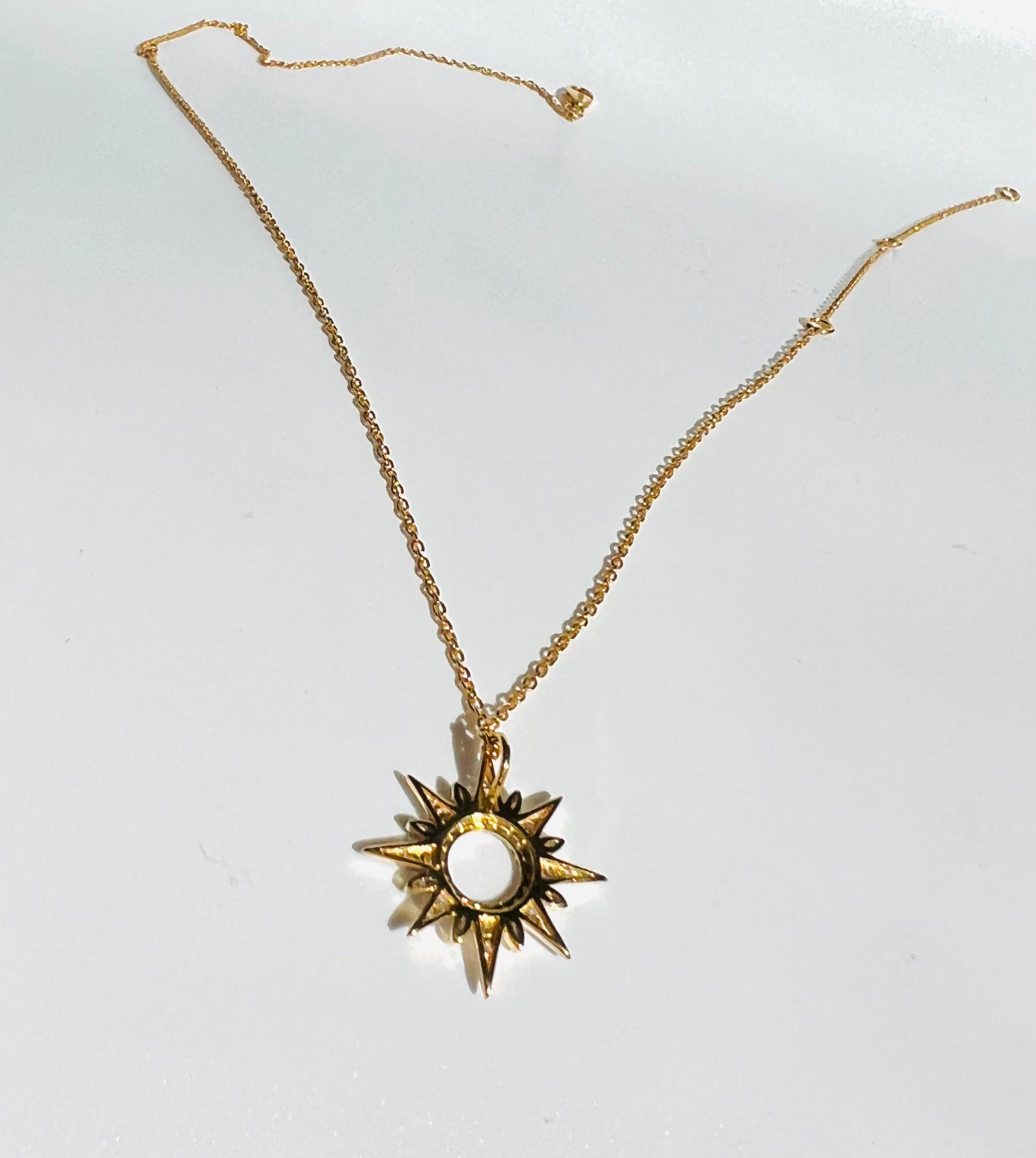 sunburst diamond pendant