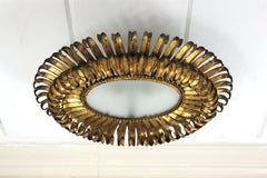 Sunburst Eyelash Ceiling Light Fixture in Gilt Wrought Iron, France 1950s