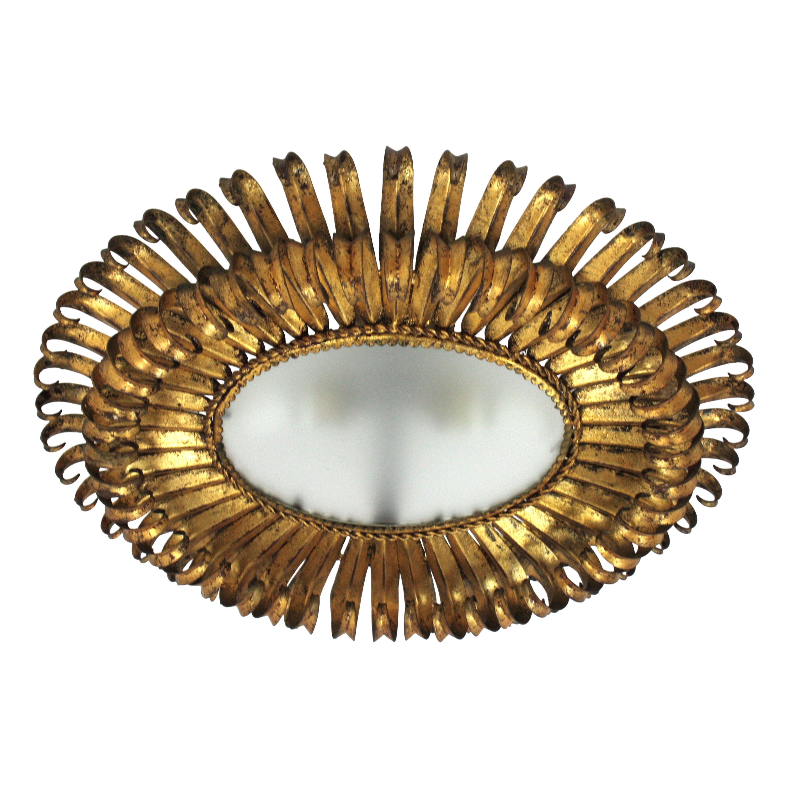 Sunburst Eyelash Ceiling Light Fixture in Gilt Wrought Iron, France 1950s For Sale