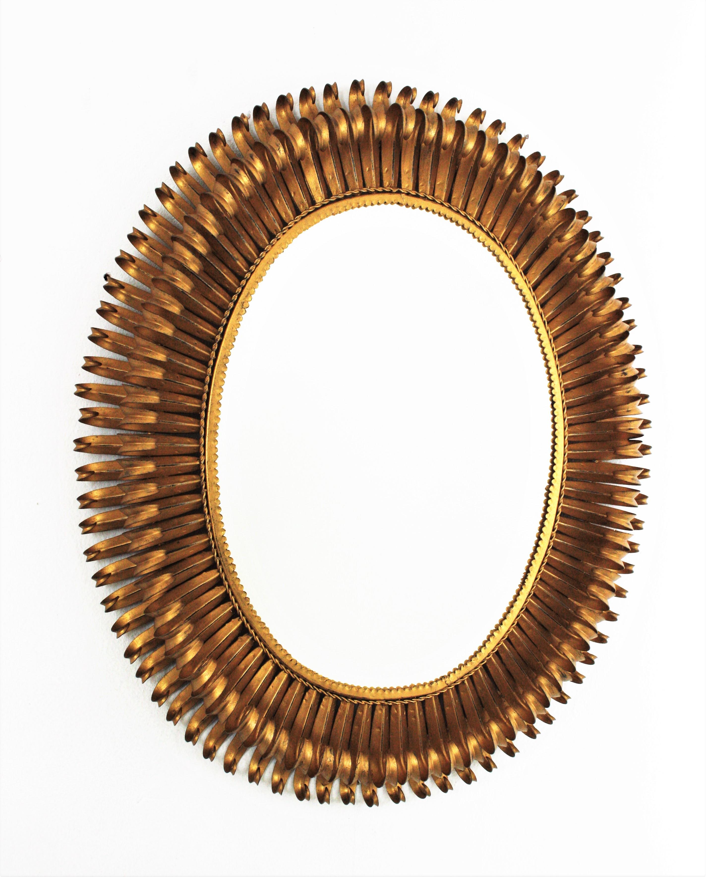 Eye-catching double layered eyelash gilt iron large sunburst mirror, France, 1950s
The frame is made by a double layer of curved beams in eyelash shape.
It will be a nice midcentury addition wherever you place it. Beautiful alone but gorgeous as a