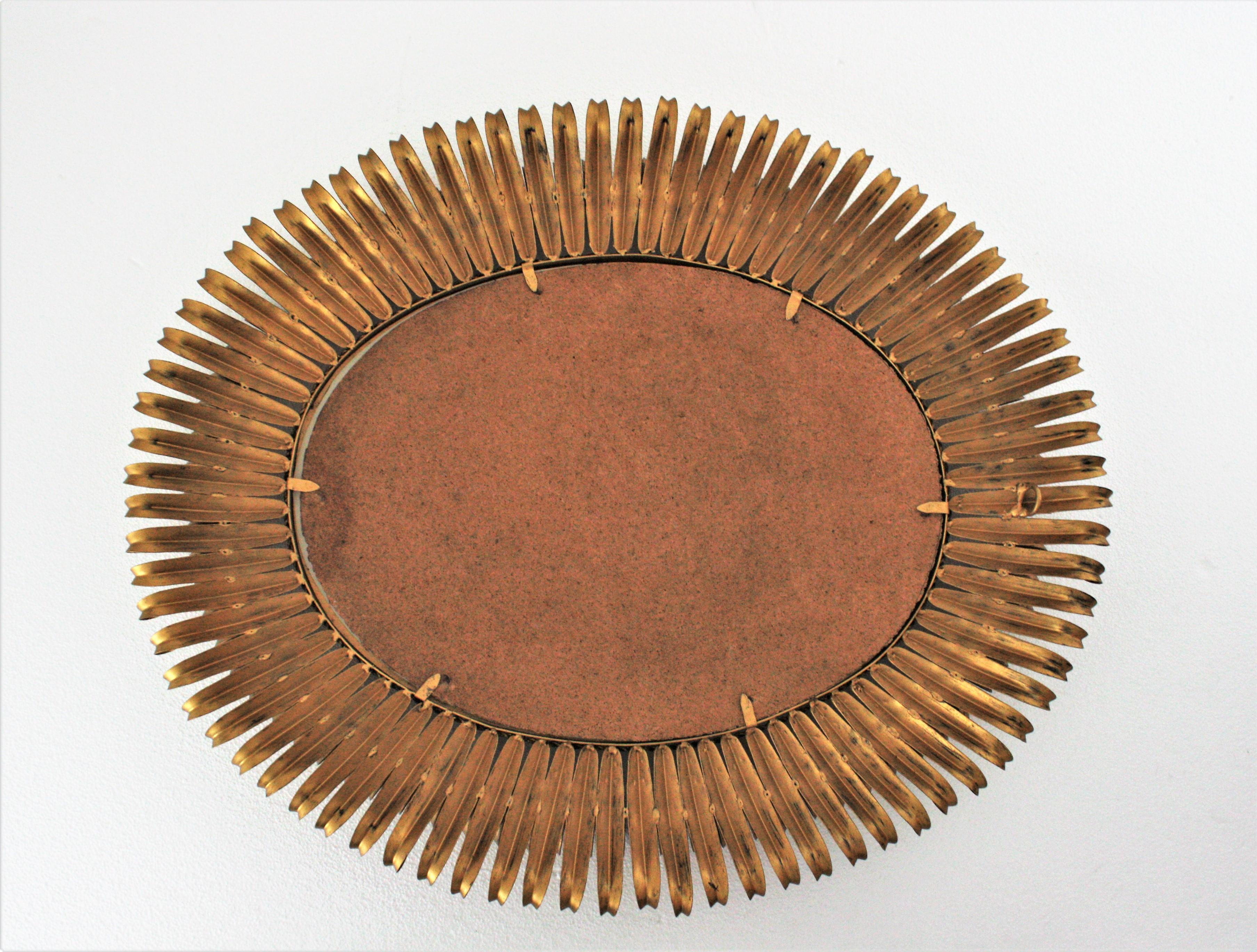 Sunburst Eyelash Large Oval Mirror in Gilt Wrought Iron For Sale 1