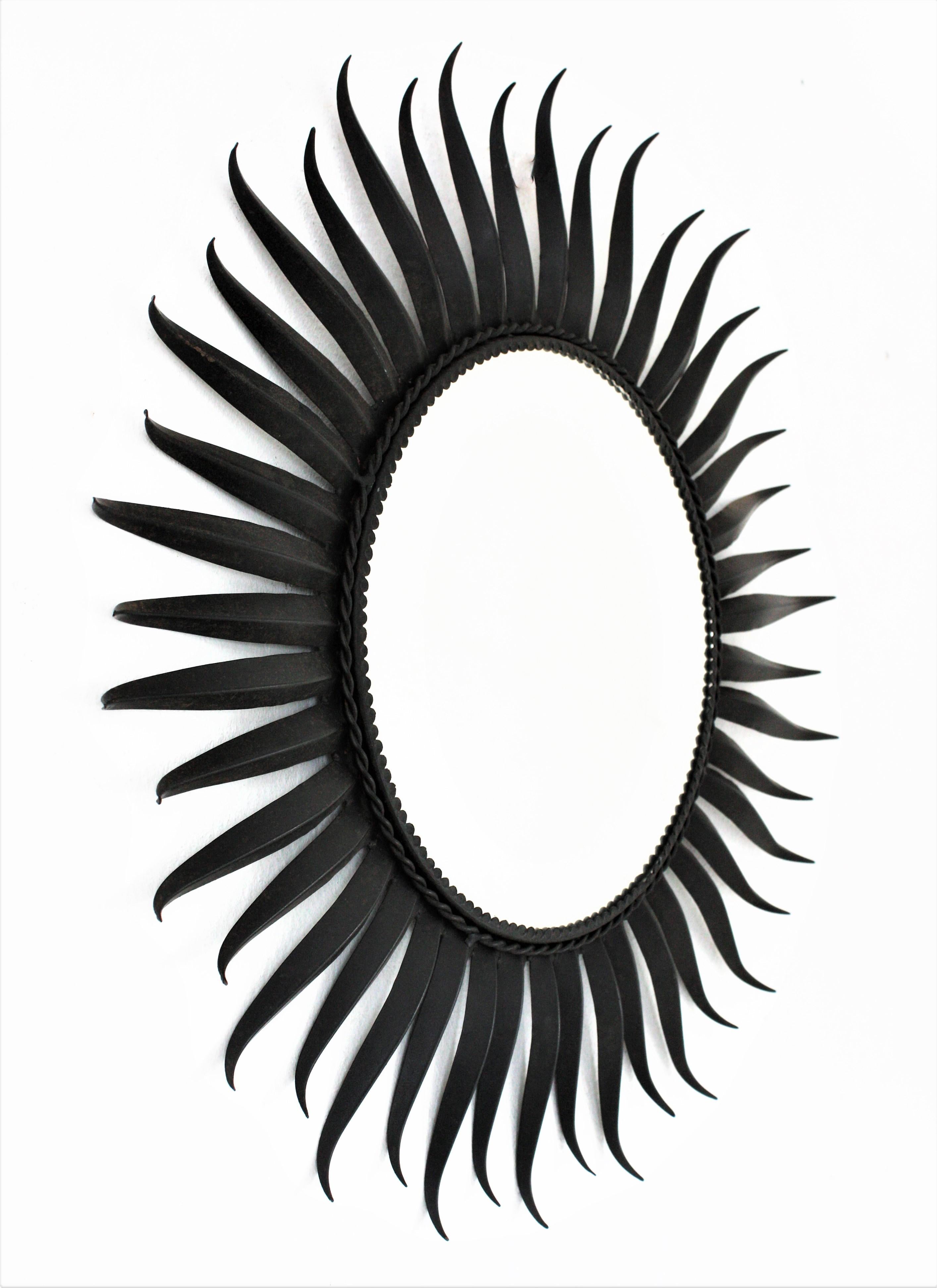 French Sunburst Eyelash Mirror in Black Wrought Iron For Sale