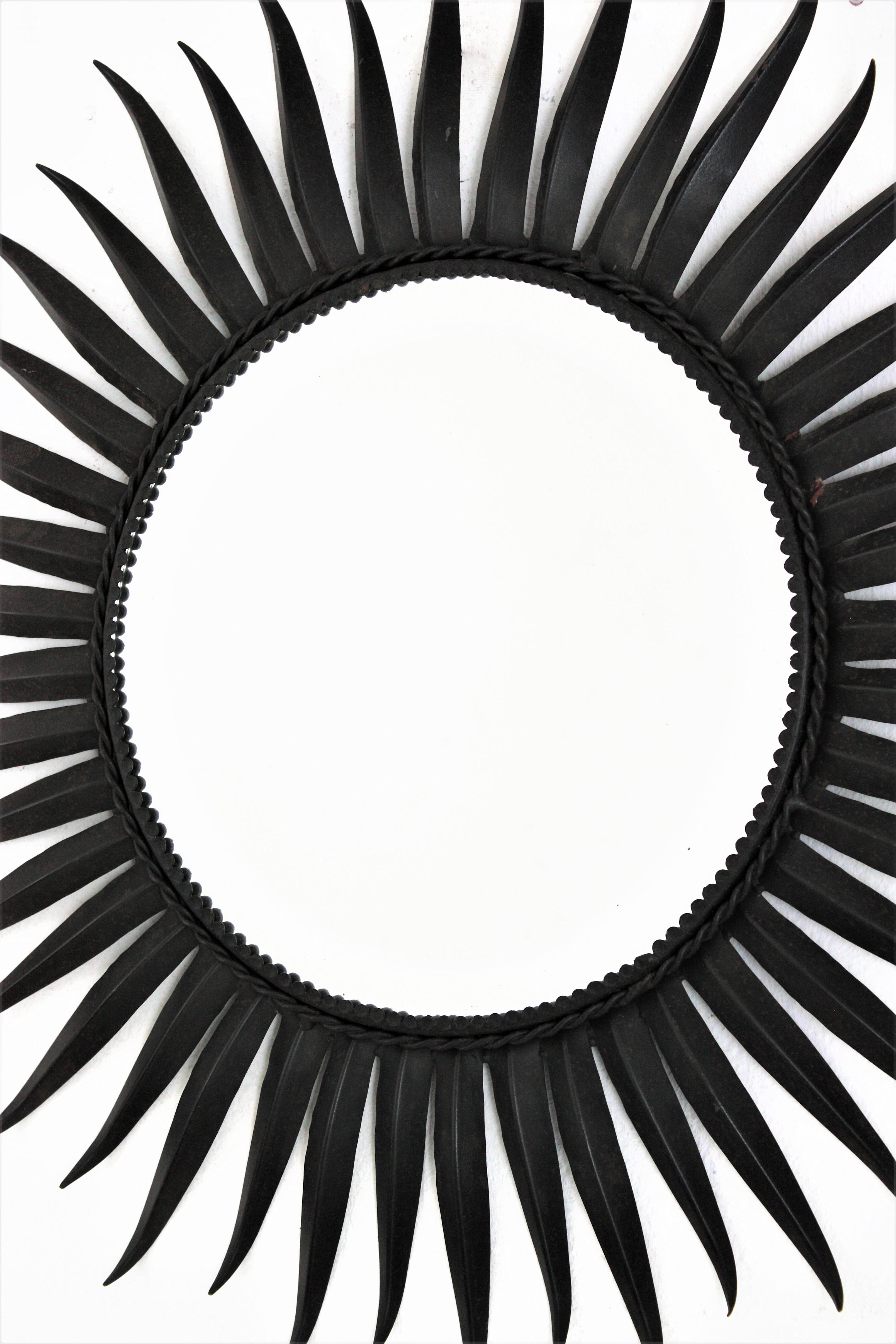 Metal Sunburst Eyelash Mirror in Black Wrought Iron For Sale