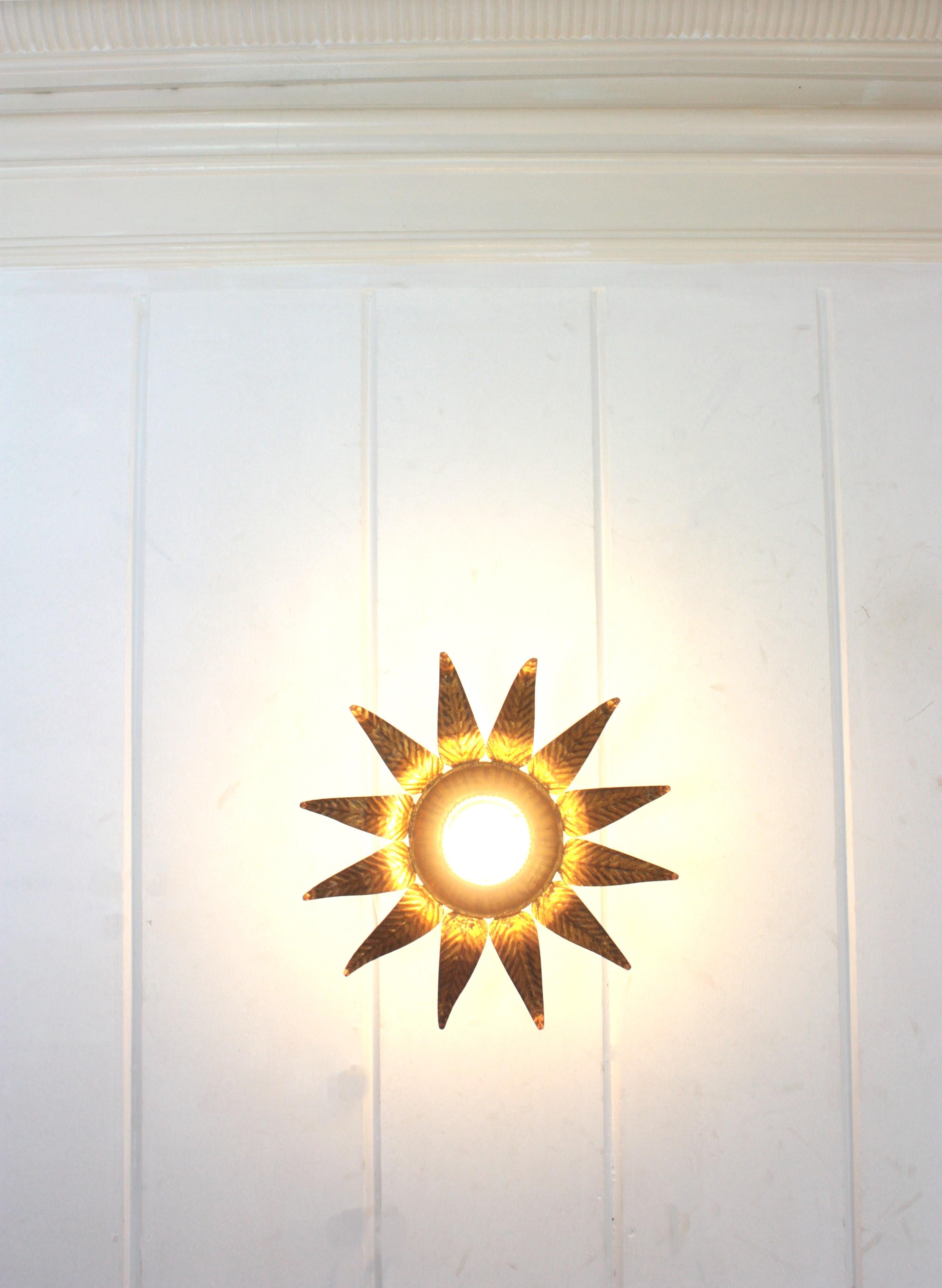 Sunburst Flower Light Fixture in Gilt Iron and Gold Leaf For Sale 7