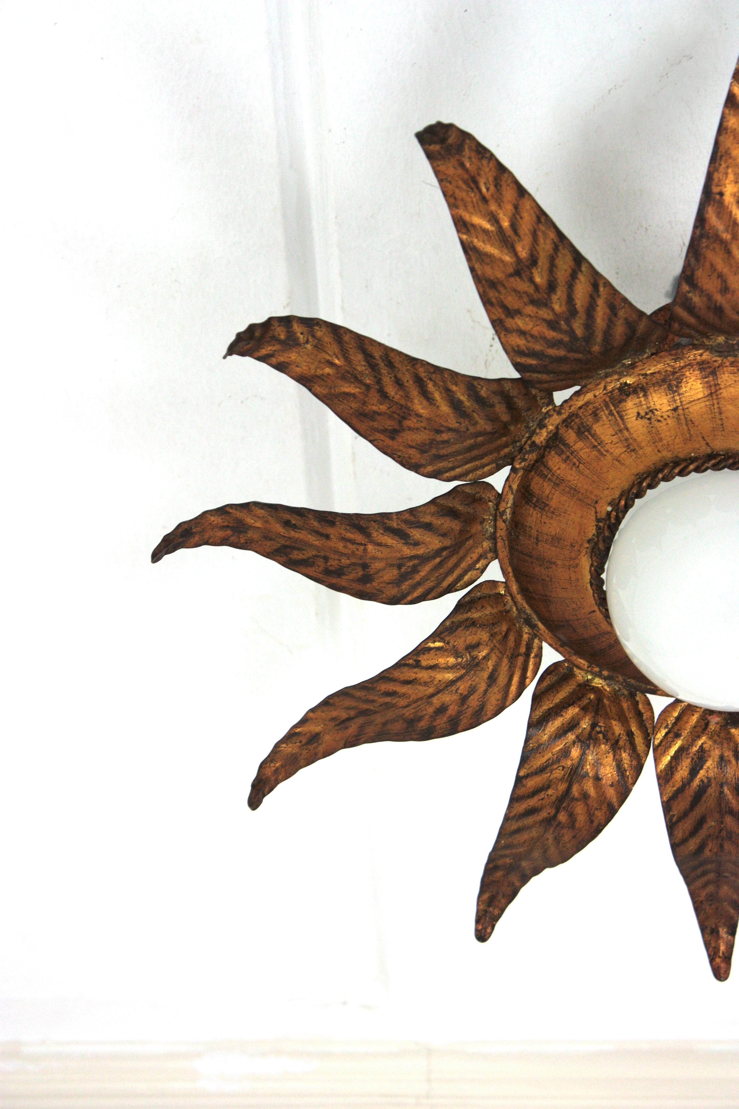 Sunburst Flower Light Fixture in Gilt Iron and Gold Leaf For Sale 9