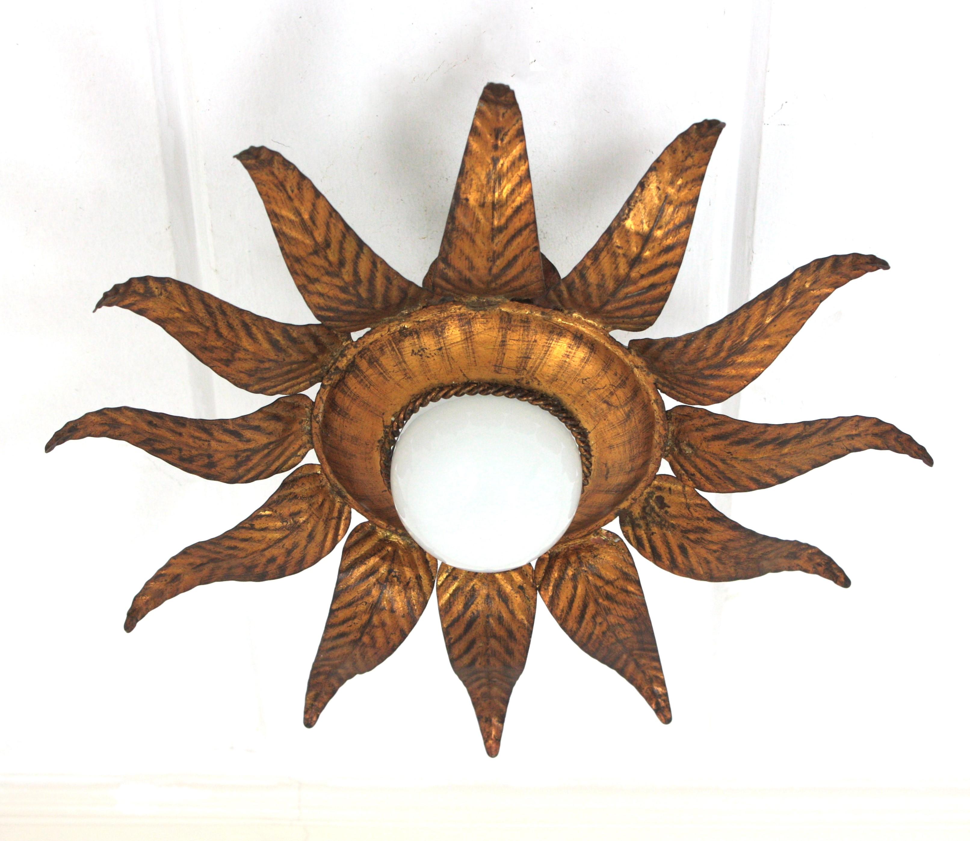 Mid-Century Modern Sunburst Flower Light Fixture in Gilt Iron and Gold Leaf For Sale