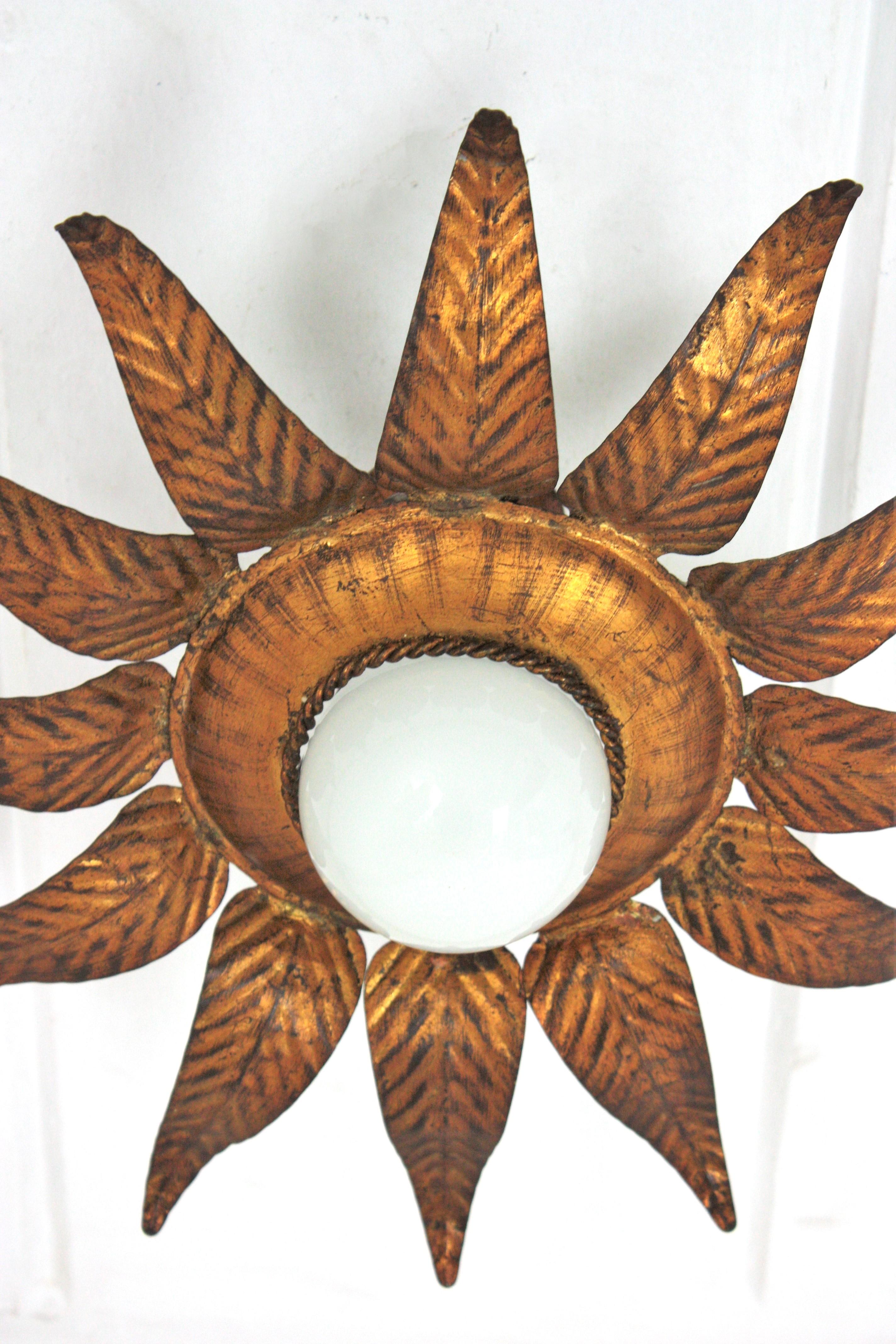 Metal Sunburst Flower Light Fixture in Gilt Iron and Gold Leaf