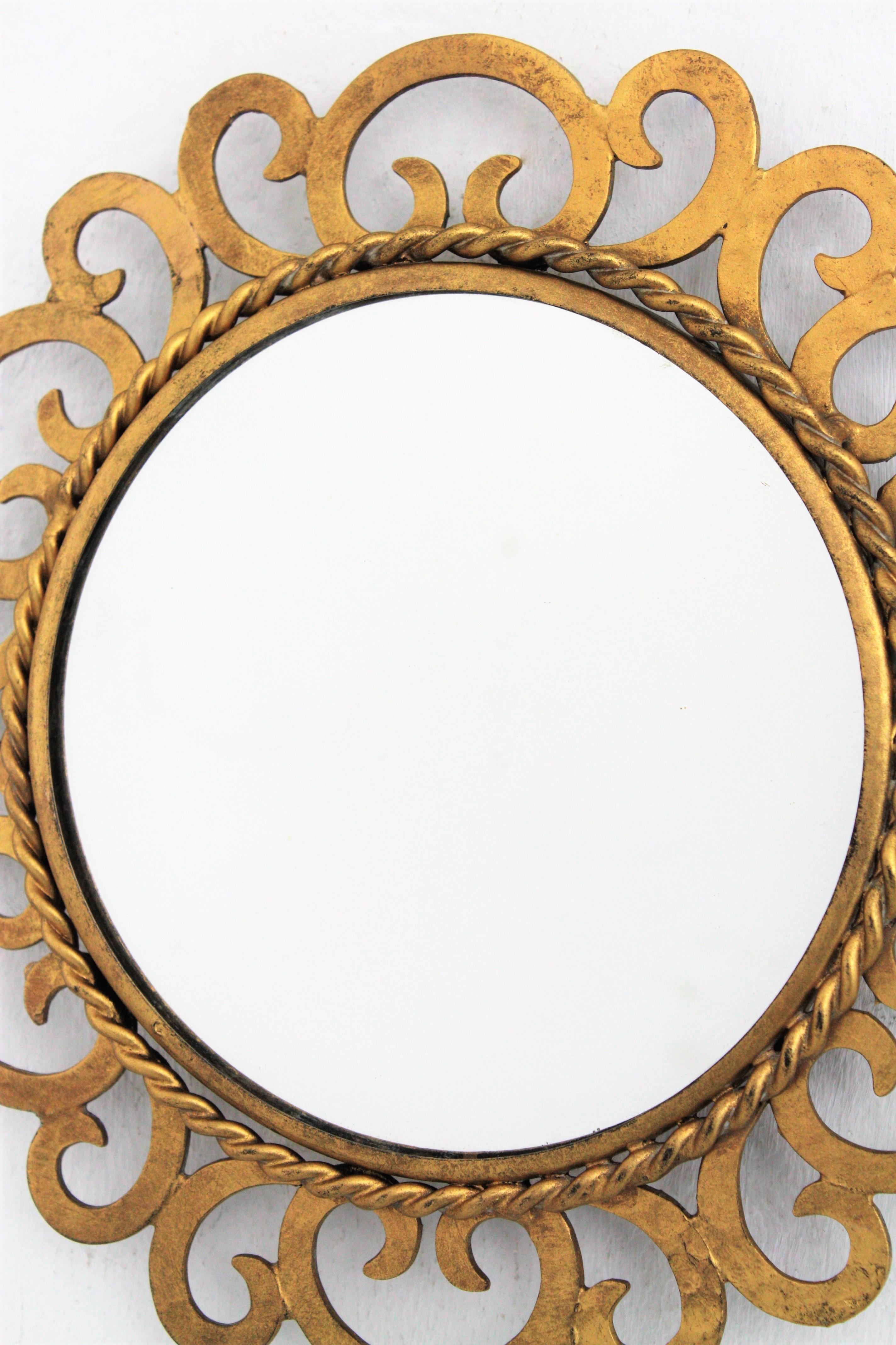 Spanish Mini Sized Sunburst Mirror with Scrollwork, Gilt Iron For Sale