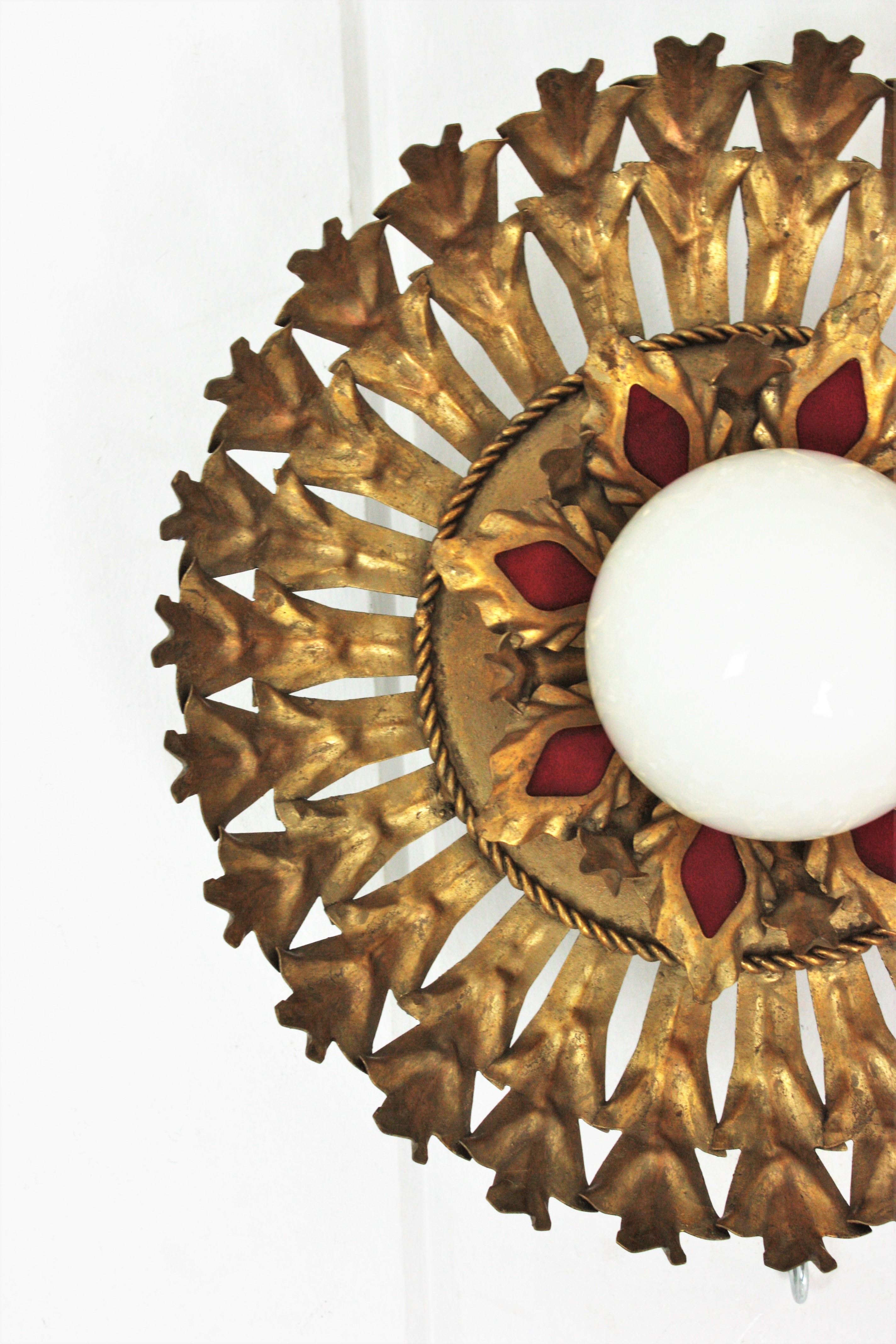 Sunburst Flush Mount in Gilt Iron with Milk Glass Globe For Sale 4