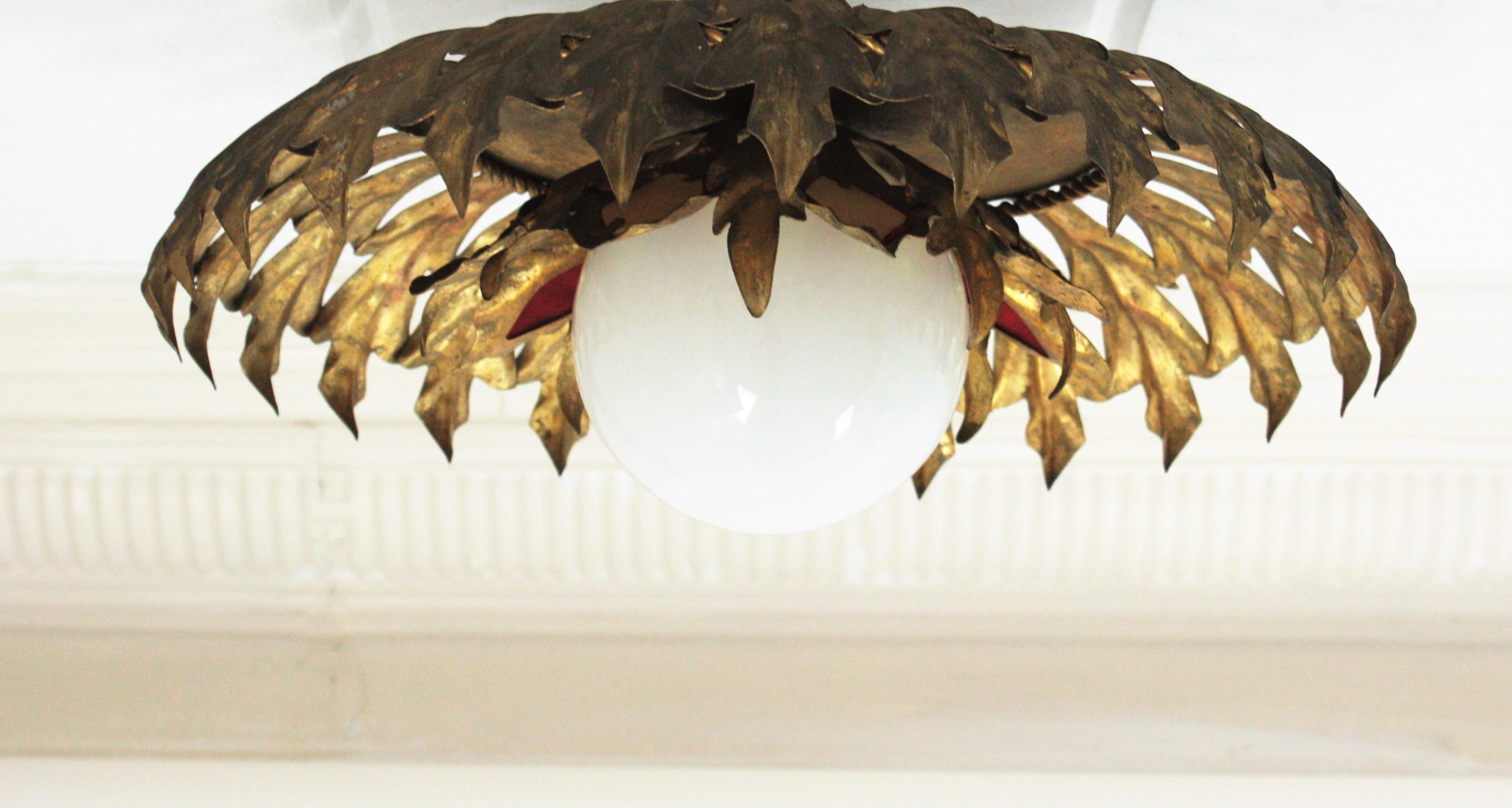 Sunburst Flush Mount Light Fixture in Gilt Iron and Milk Glass Globe For Sale 8