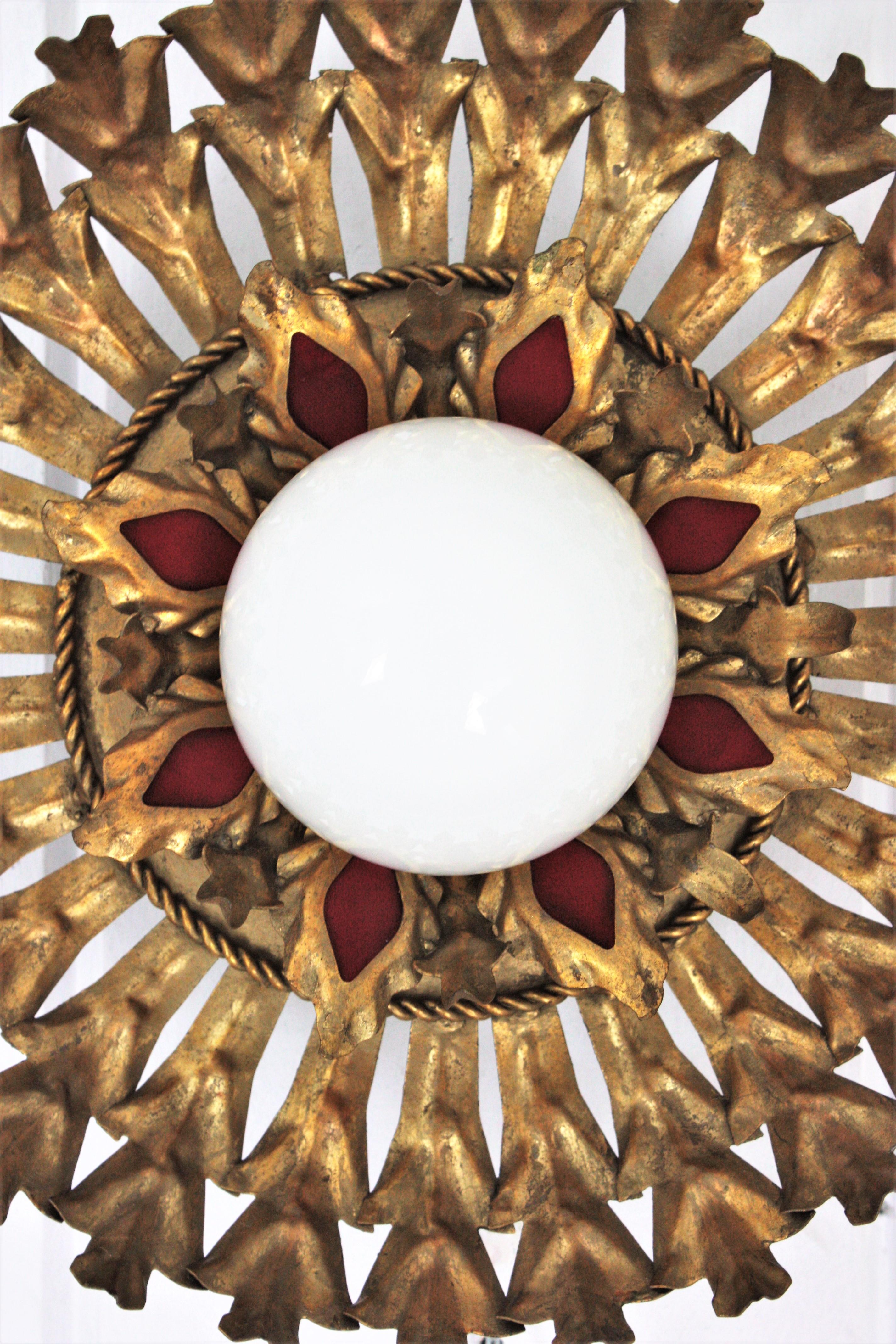 Metal Sunburst Flush Mount Light Fixture in Gilt Iron and Milk Glass Globe For Sale