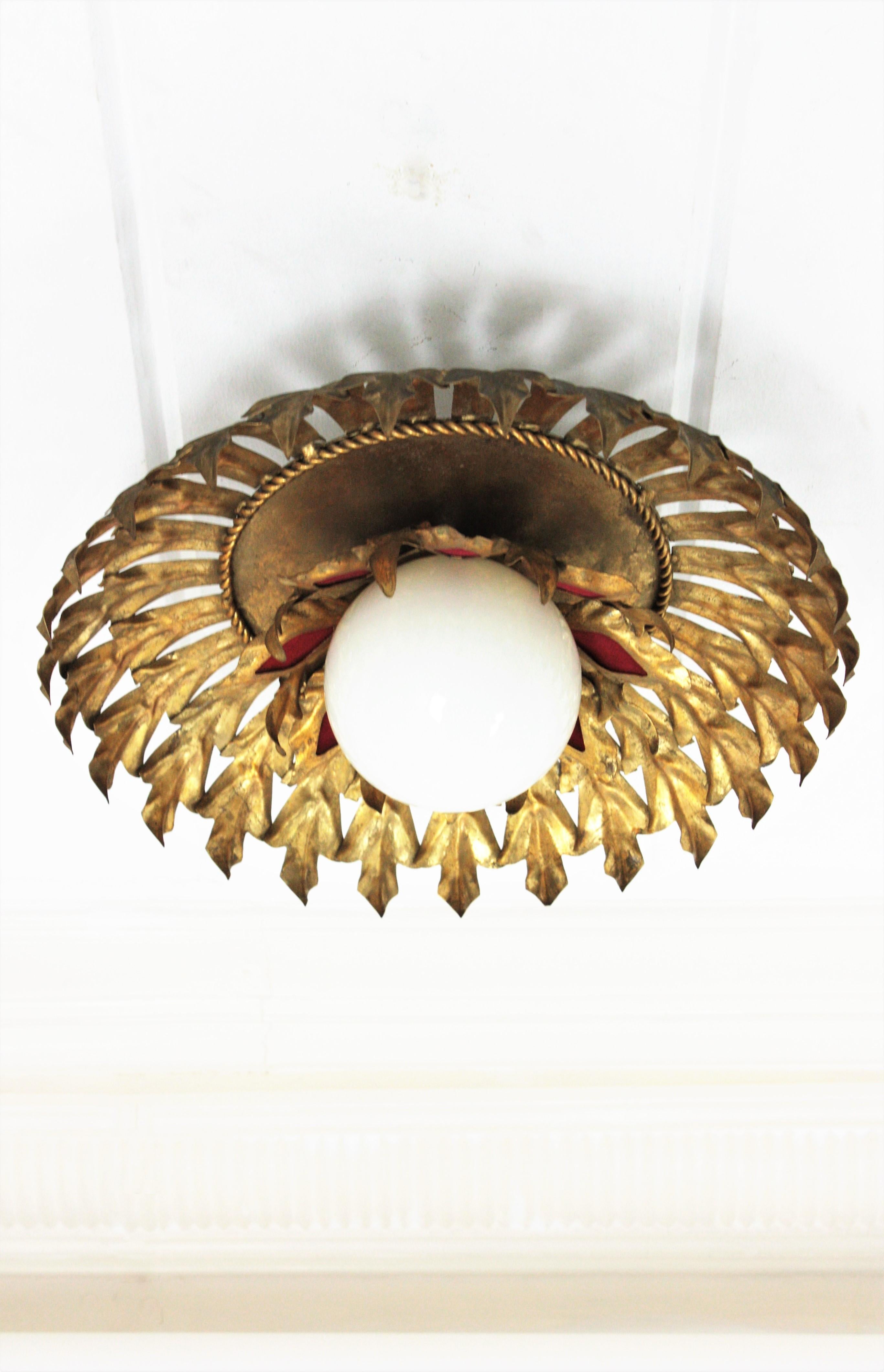 Sunburst Flush Mount Light Fixture in Gilt Iron and Milk Glass Globe For Sale 2