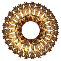 Sunburst Flush Mount Light Fixture in Gilt Iron and Milk Glass Globe