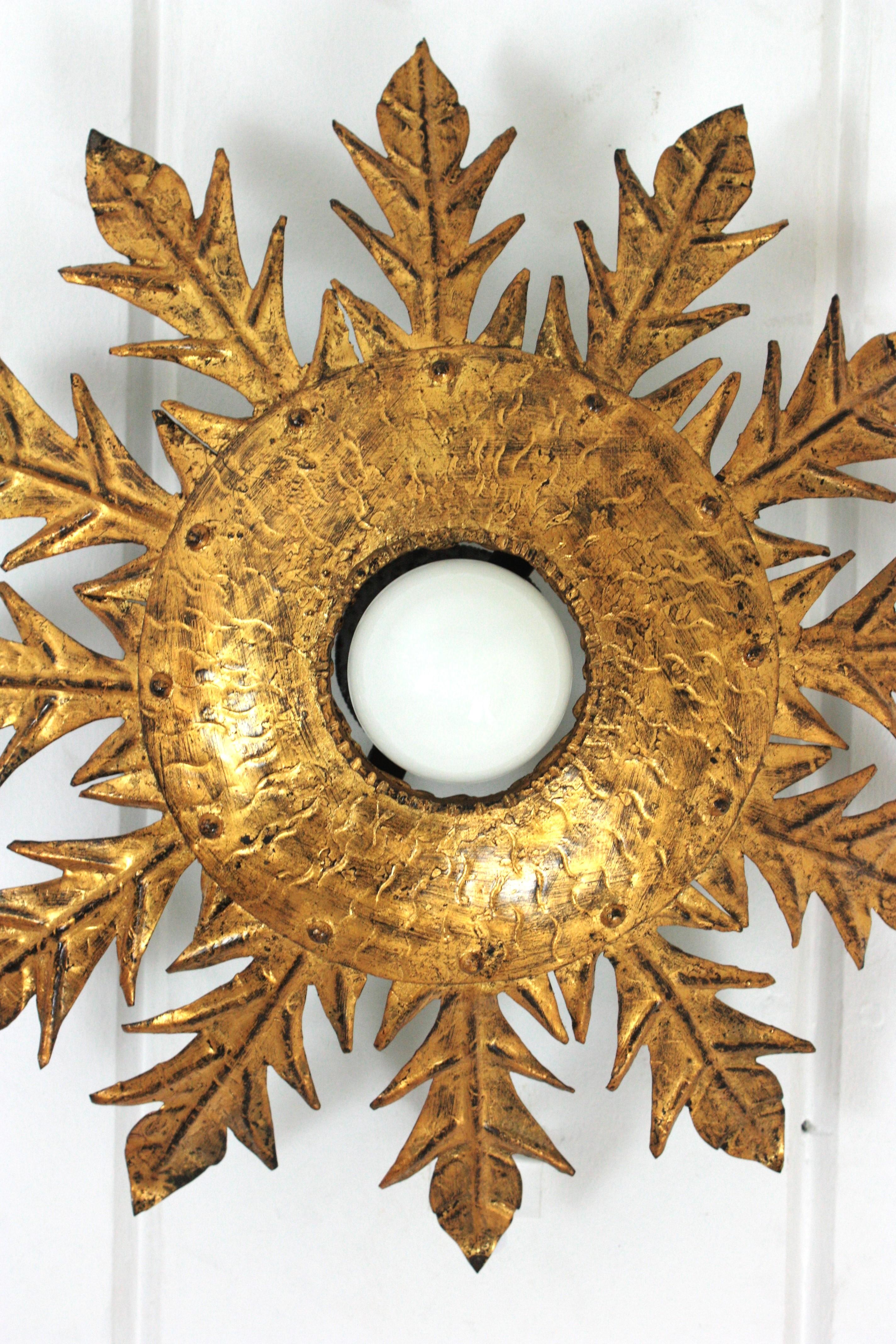 Sunburst Flush Mount Light Fixture with Leaves, Gilt Wrought Iron, 1950s (Französisch) im Angebot