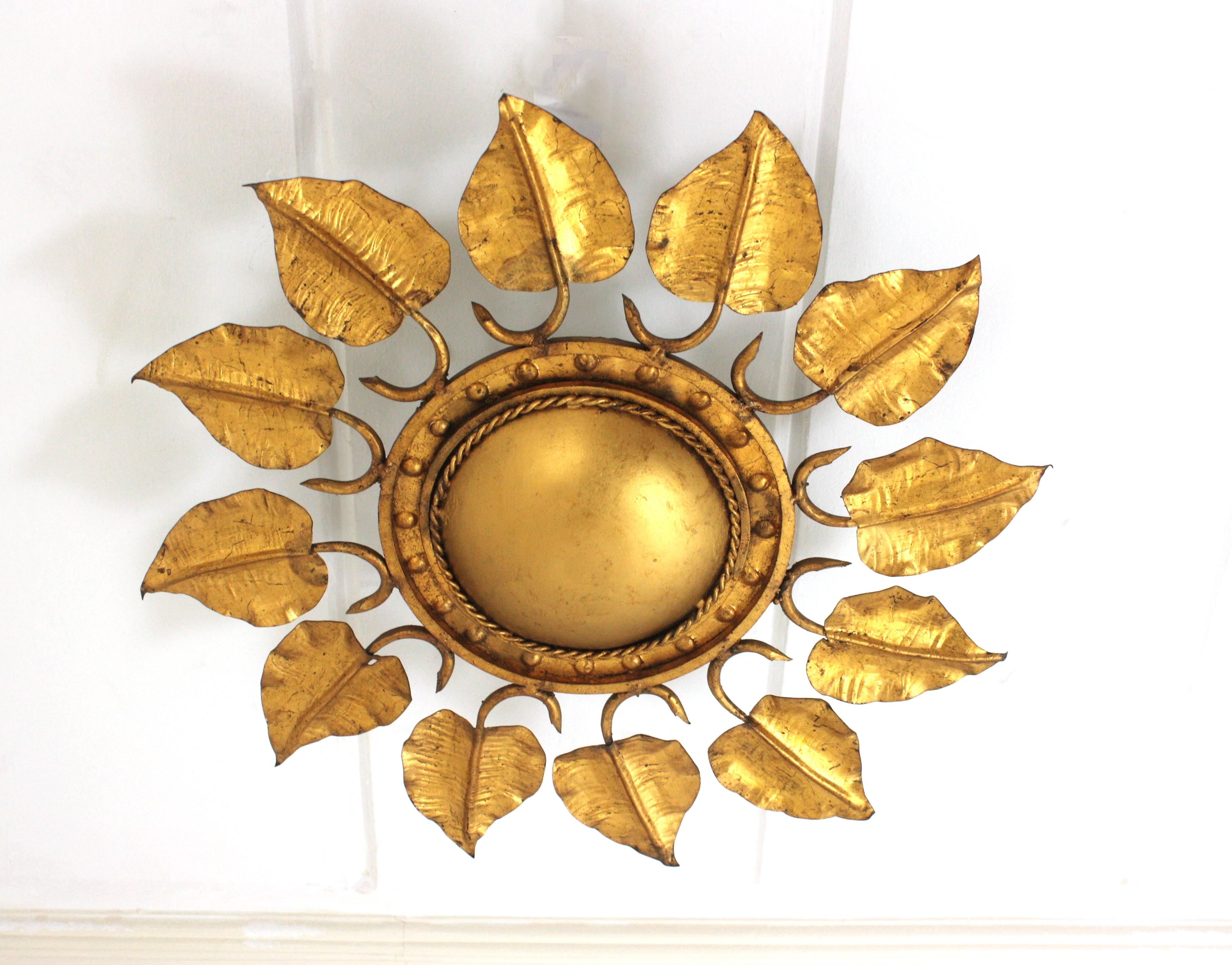 One of a Kind Ferro Art Sunburst Ceiling Light Fixture with Leaves Detail, Gilt Iron, Gold Leaf
________________________________________________________
Unique gilt wrought iron sunburst leafed ceiling flush mount in the style of Brutalism.