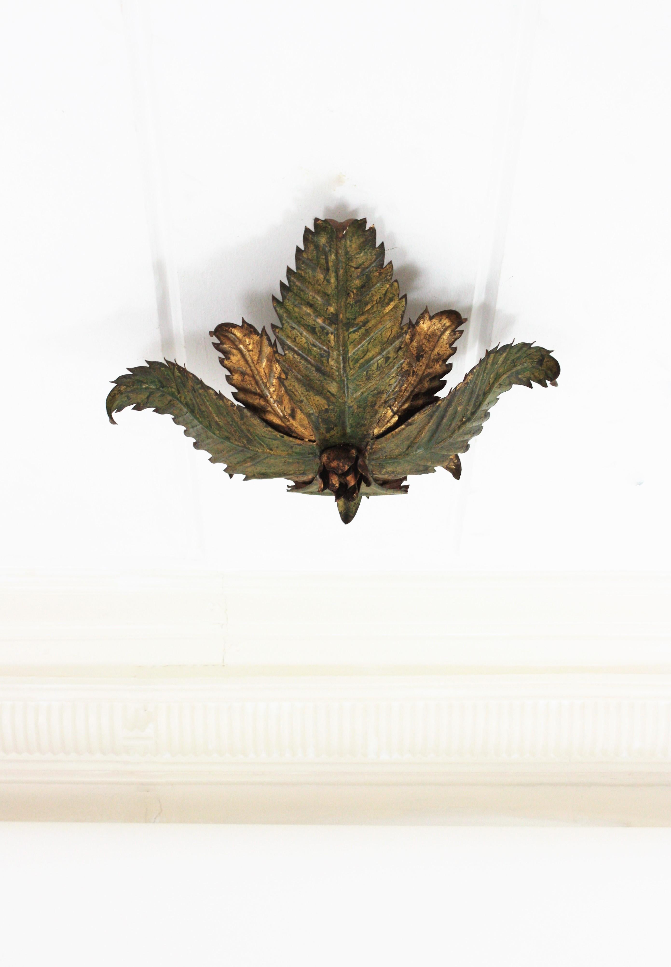 Hollywood Regency Sunburst Foliage Floral Light Fixture in Two-Tone Gilt Wrought Iron, 1950s For Sale