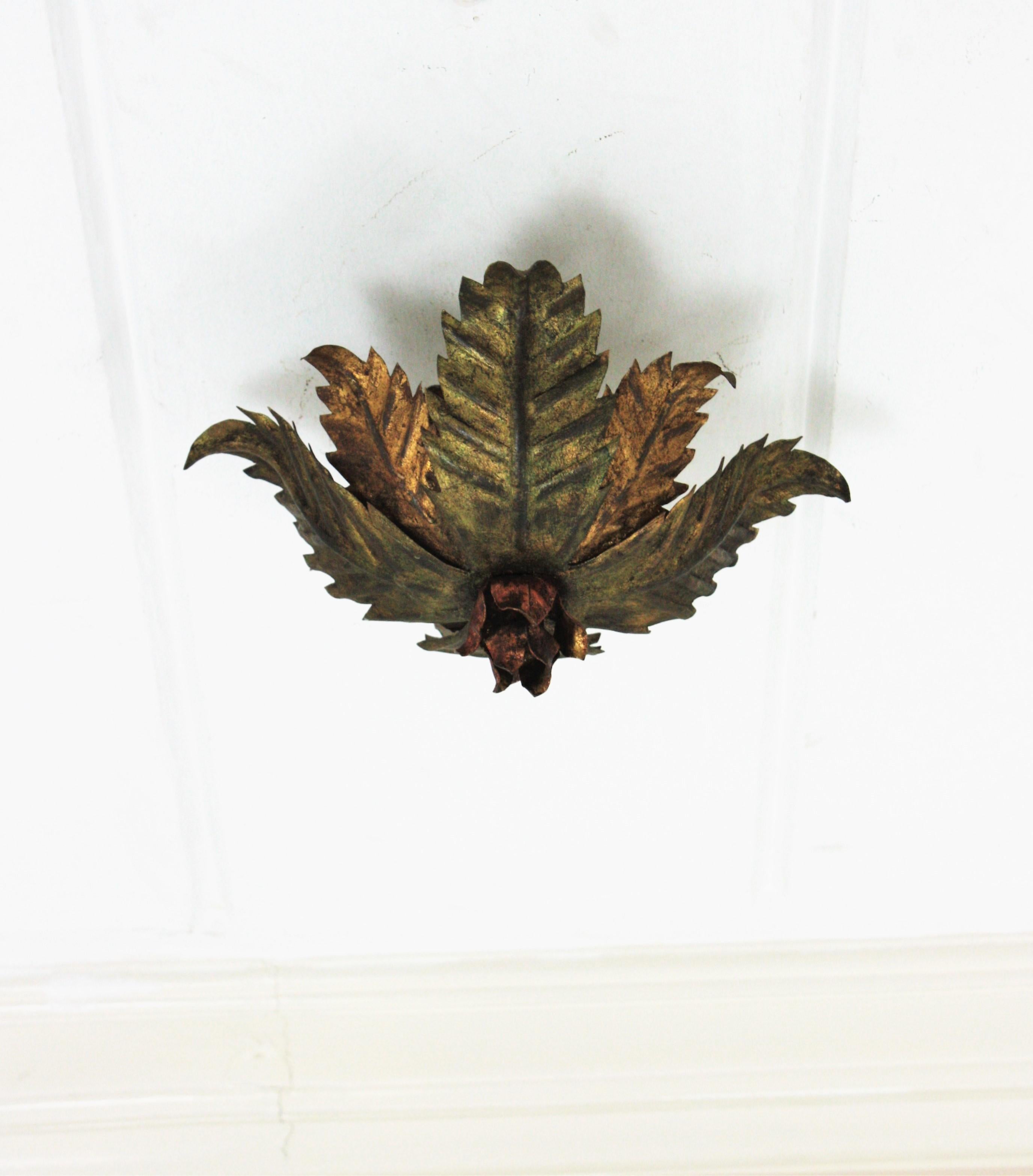 Hollywood Regency Sunburst Foliage Floral Light Fixture in Two-Tone Gilt Wrought Iron, 1950s 