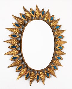 Sunburst Mirror with Blue Glasses, Gilt Iron, Hollywood Regency Style