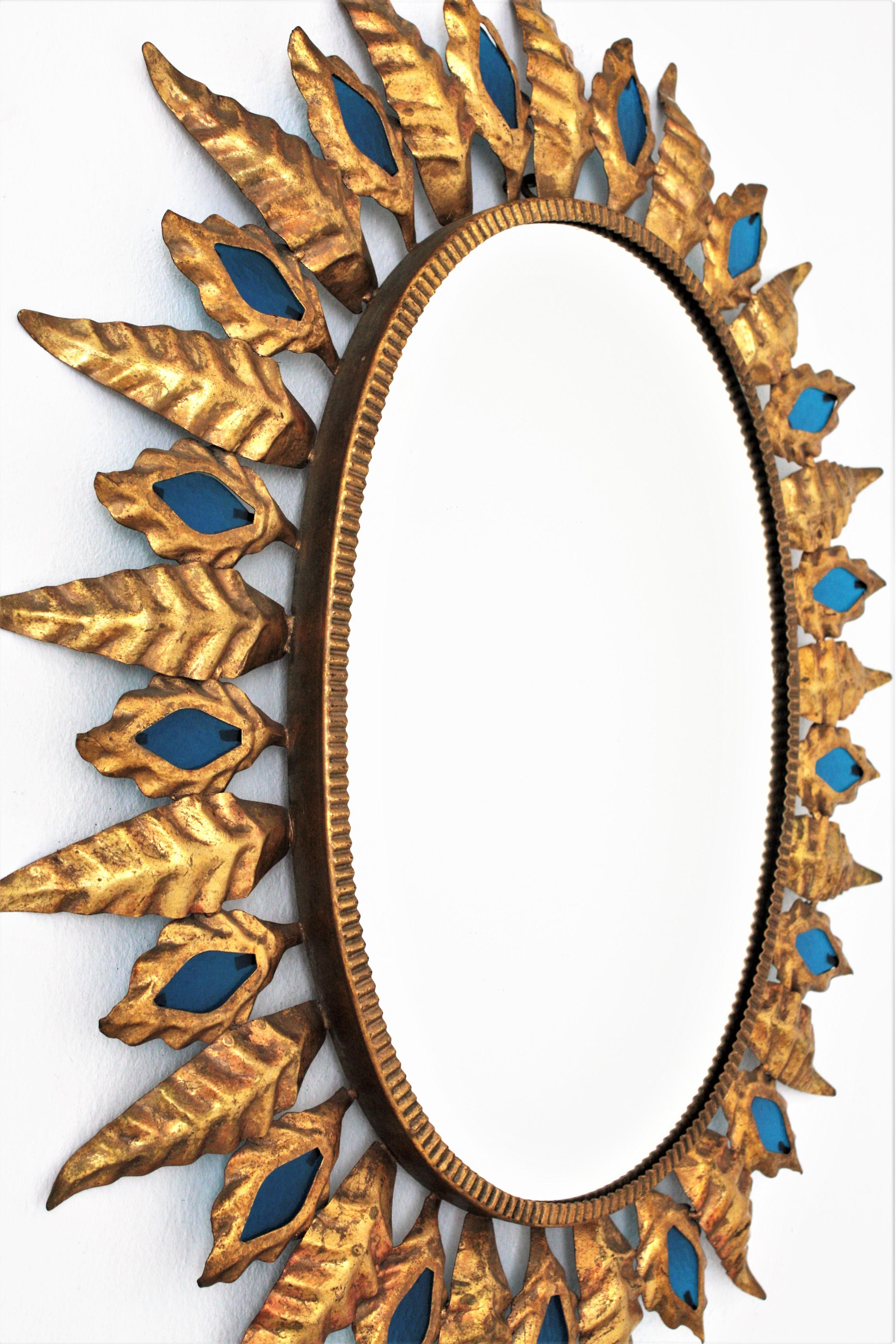 Sunburst Mirror with Blue Glasses, Gilt Iron, Hollywood Regency Style In Excellent Condition In Barcelona, ES