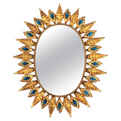 Sunburst Mirror with Blue Glasses, Gilt Iron, Hollywood Regency Style