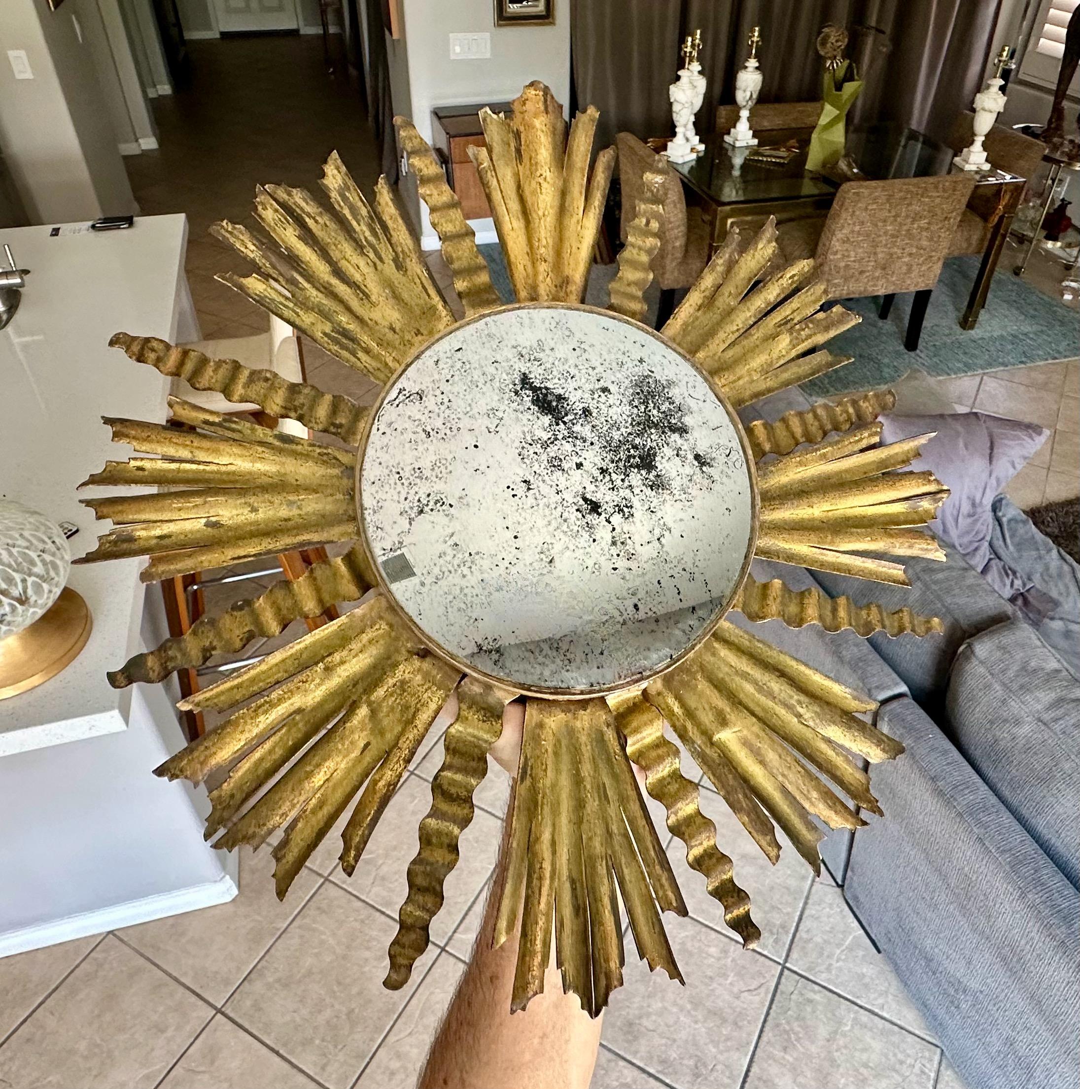 Early 20th Century Sunburst Gilt Metal Oval Convex Wall Art Mirror For Sale