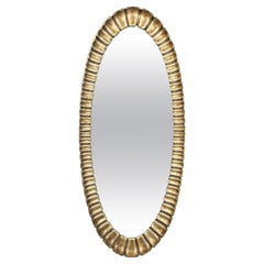 Specchio ovale in legno intagliato con foglia d'argento dorata di Francisco Hurtado, anni '50