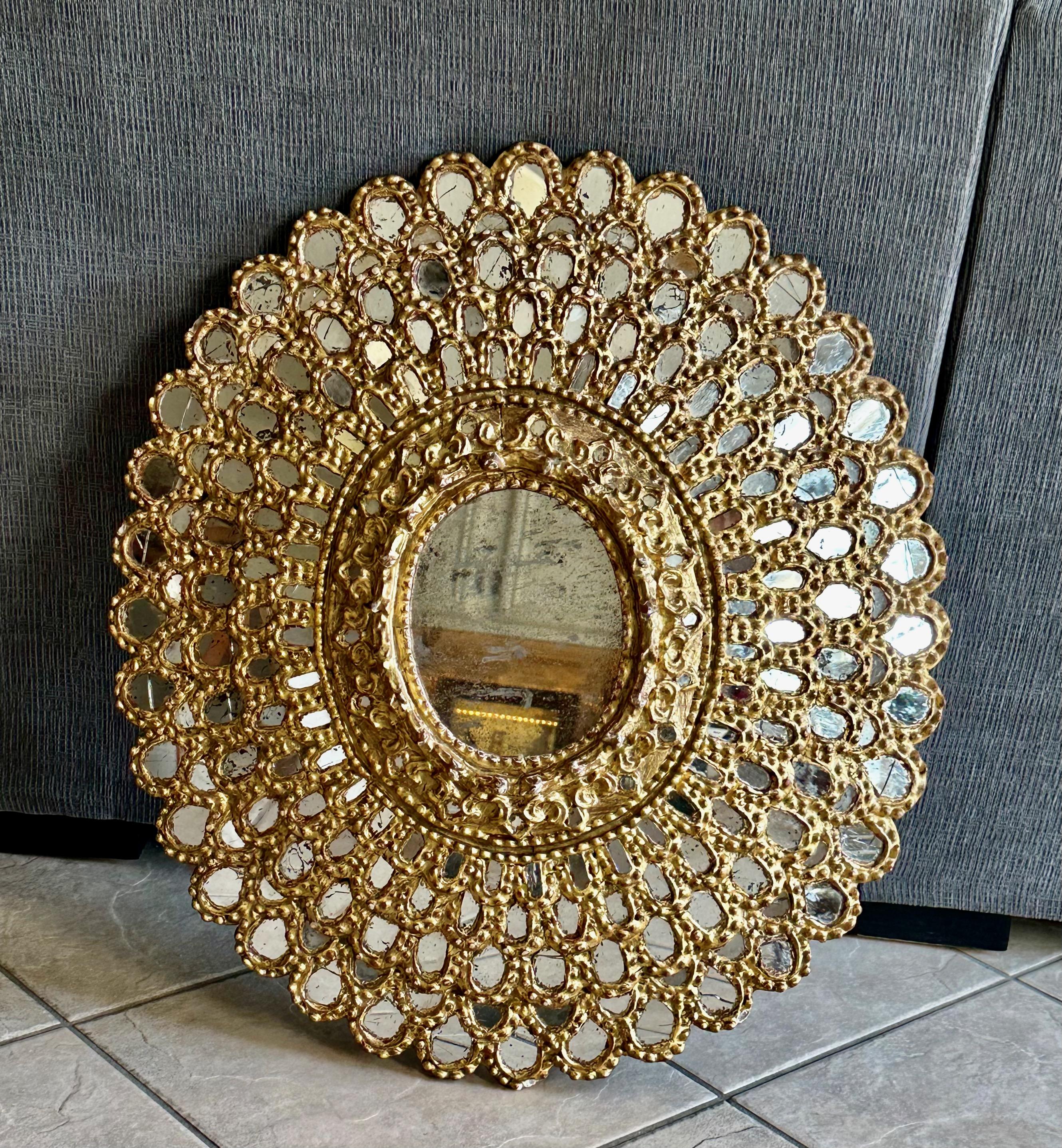 Sunburst Giltwood Spanish Colonial Peacock Wall Mirror In Good Condition For Sale In Palm Springs, CA