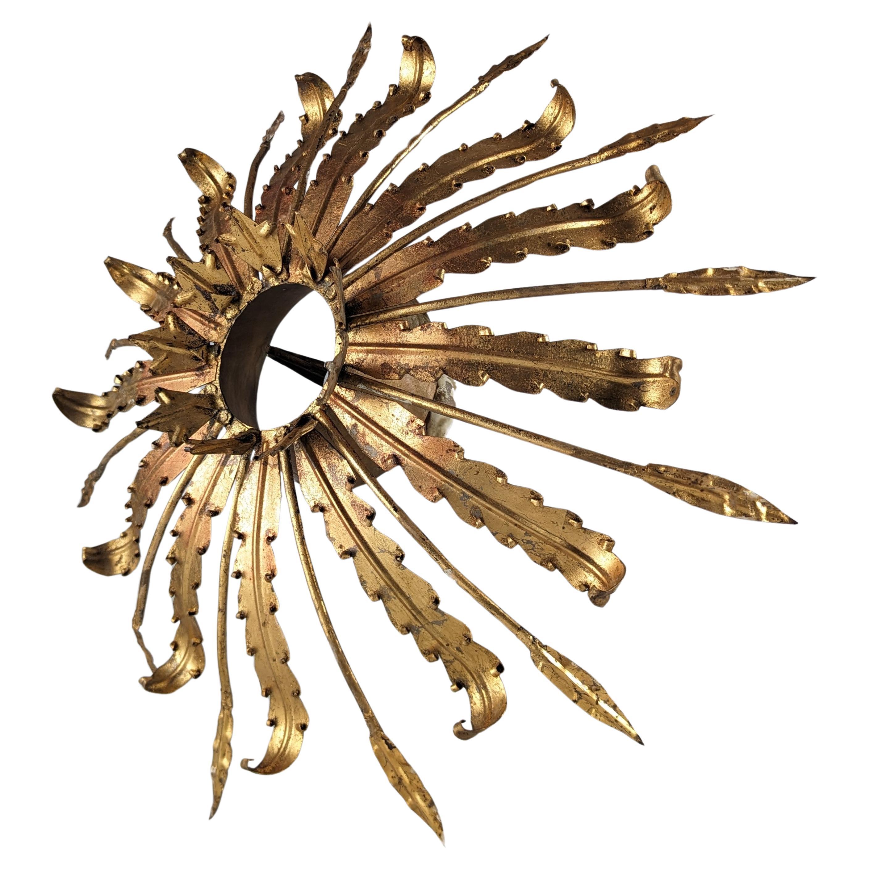 Sunburst Lamp Gilt iron leafs For Sale