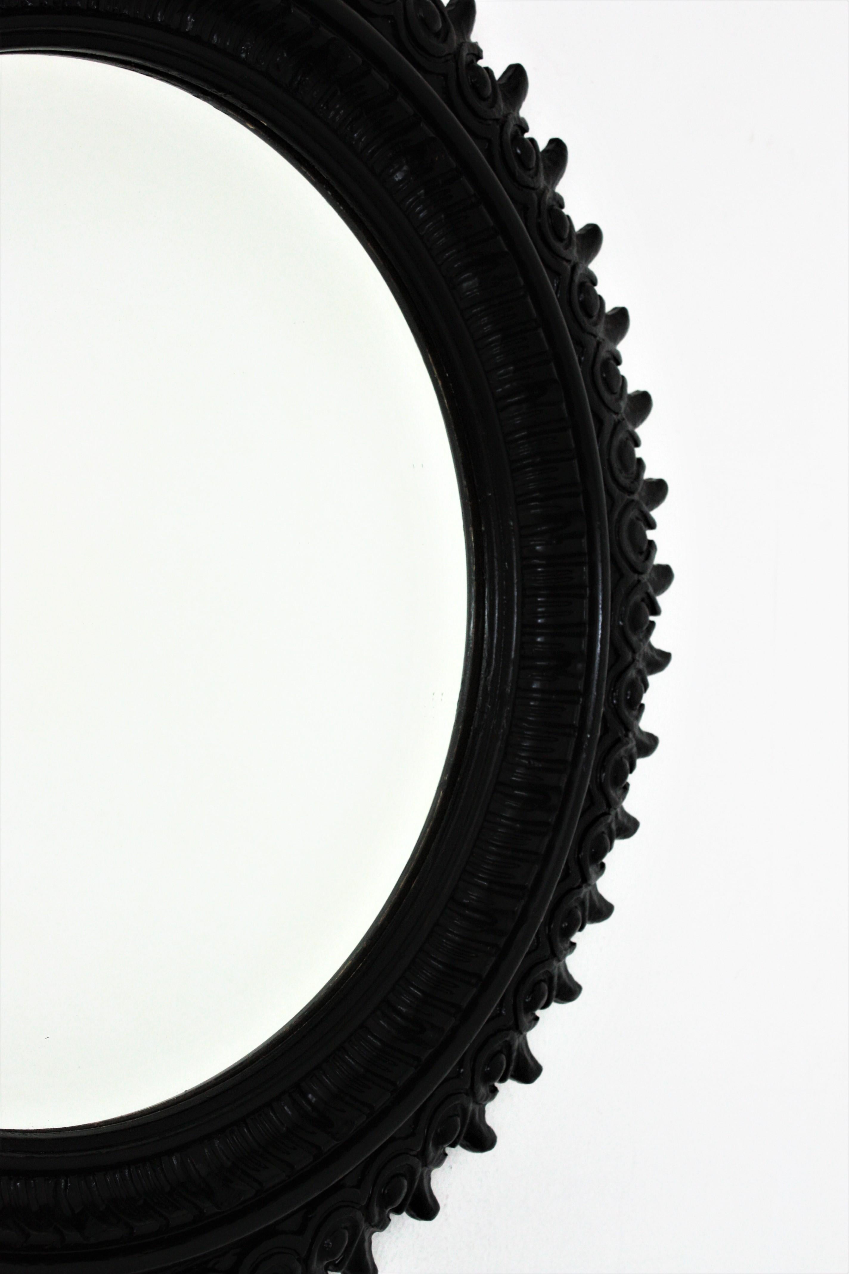 Sunburst Mirror in Carved Wood and Black Patina by Francisco Hurtado For Sale 1
