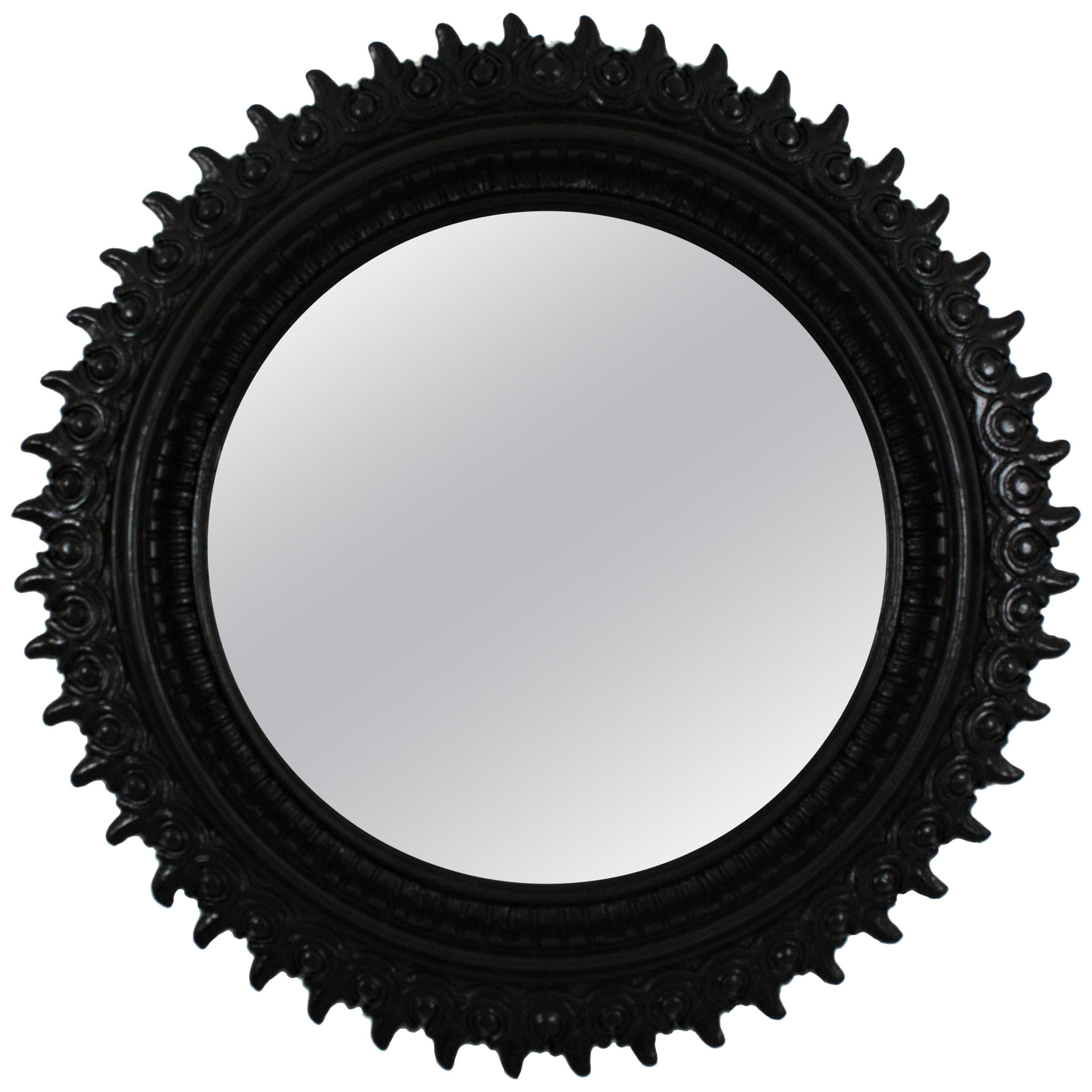 Sunburst Mirror in Carved Wood and Black Patina by Francisco Hurtado For Sale