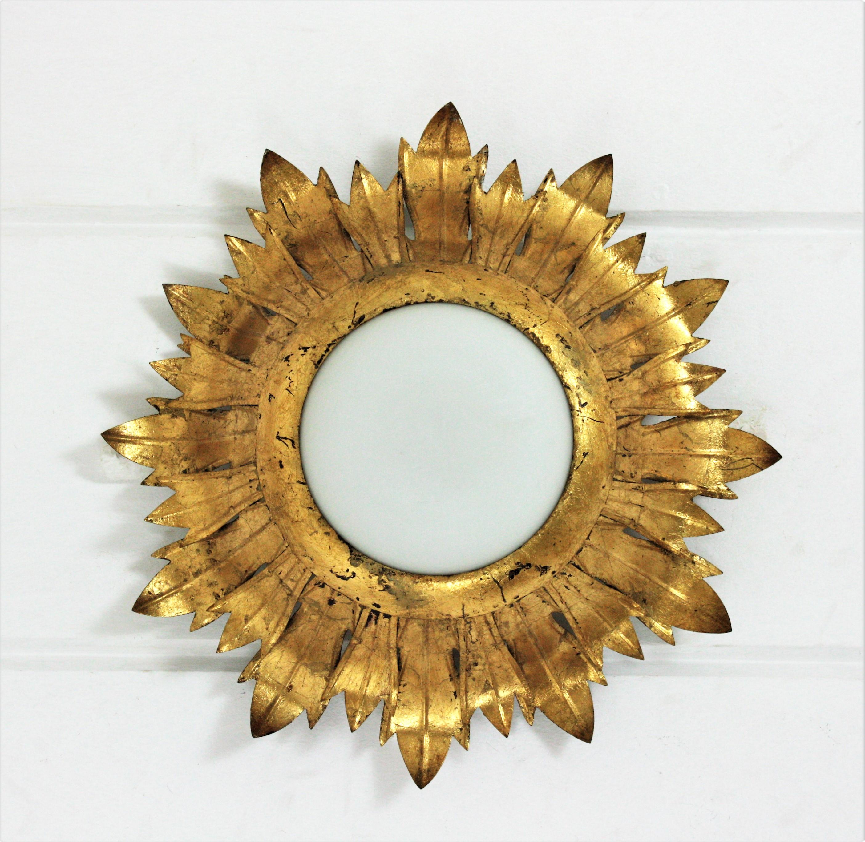 Sunburst Light Fixture in Gilt Iron and Milk Glass, 1950s In Good Condition In Barcelona, ES