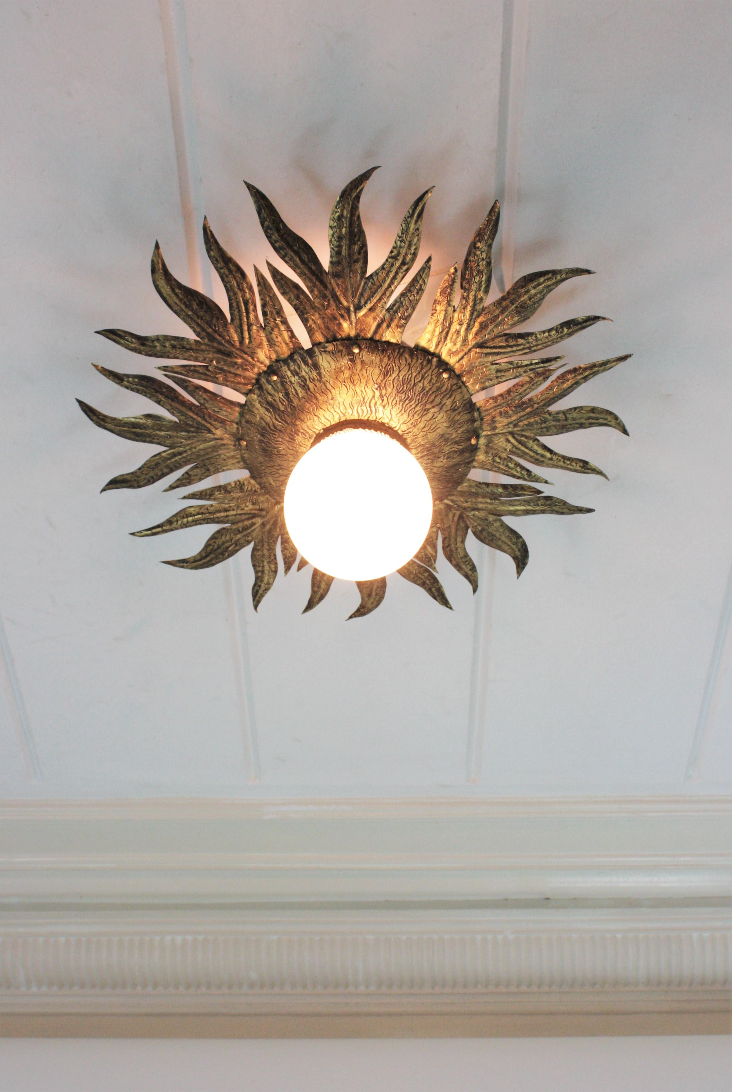 Sunburst Light Fixture in Gilt Metal and Milk Glass For Sale 3