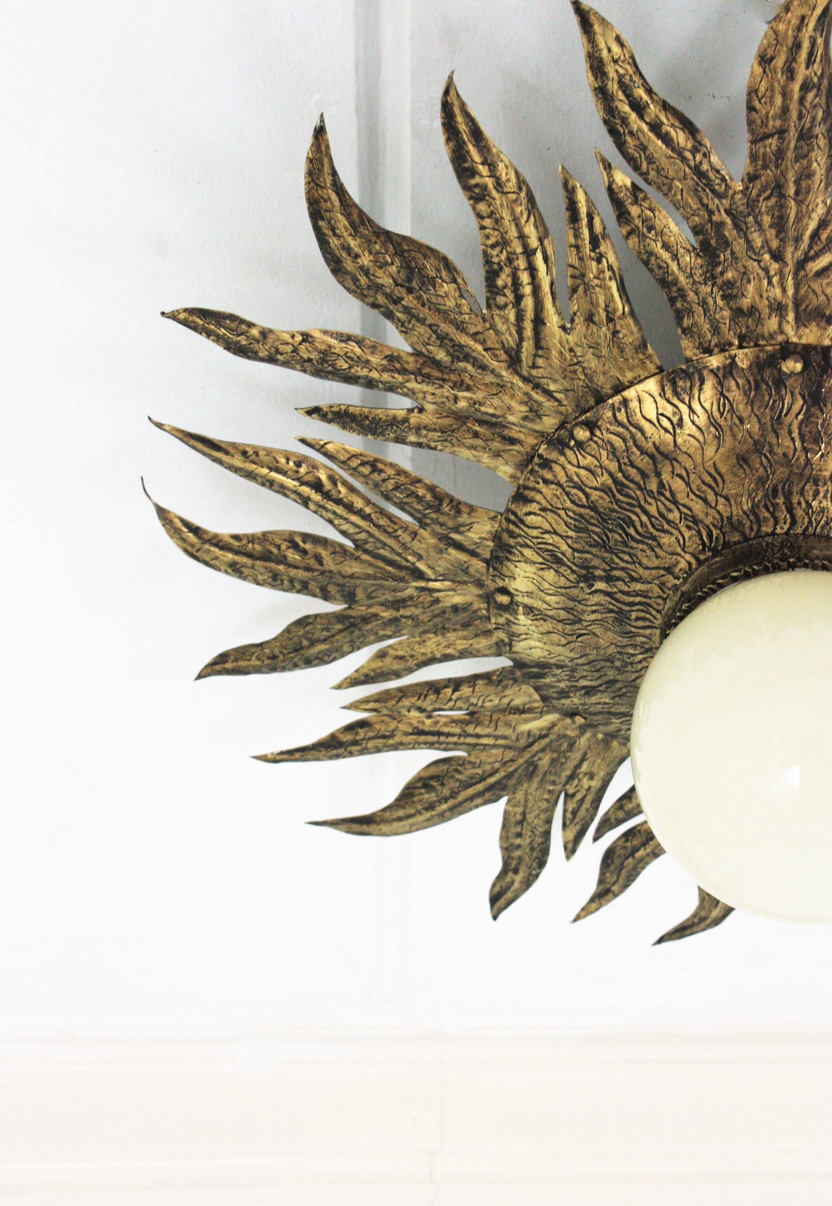 Sunburst Light Fixture in Gilt Metal and Milk Glass For Sale 6