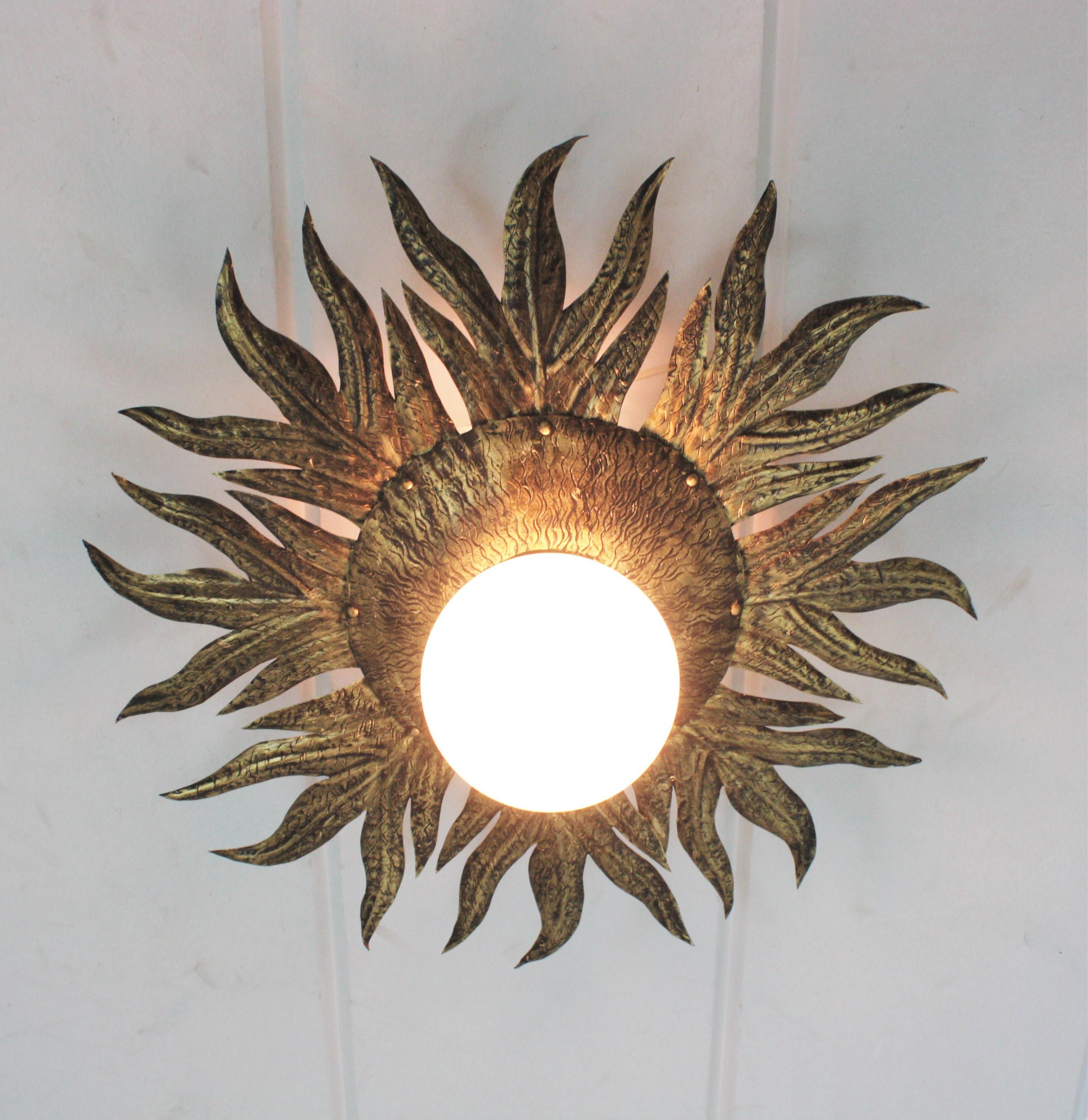 20th Century Sunburst Light Fixture in Gilt Metal and Milk Glass For Sale