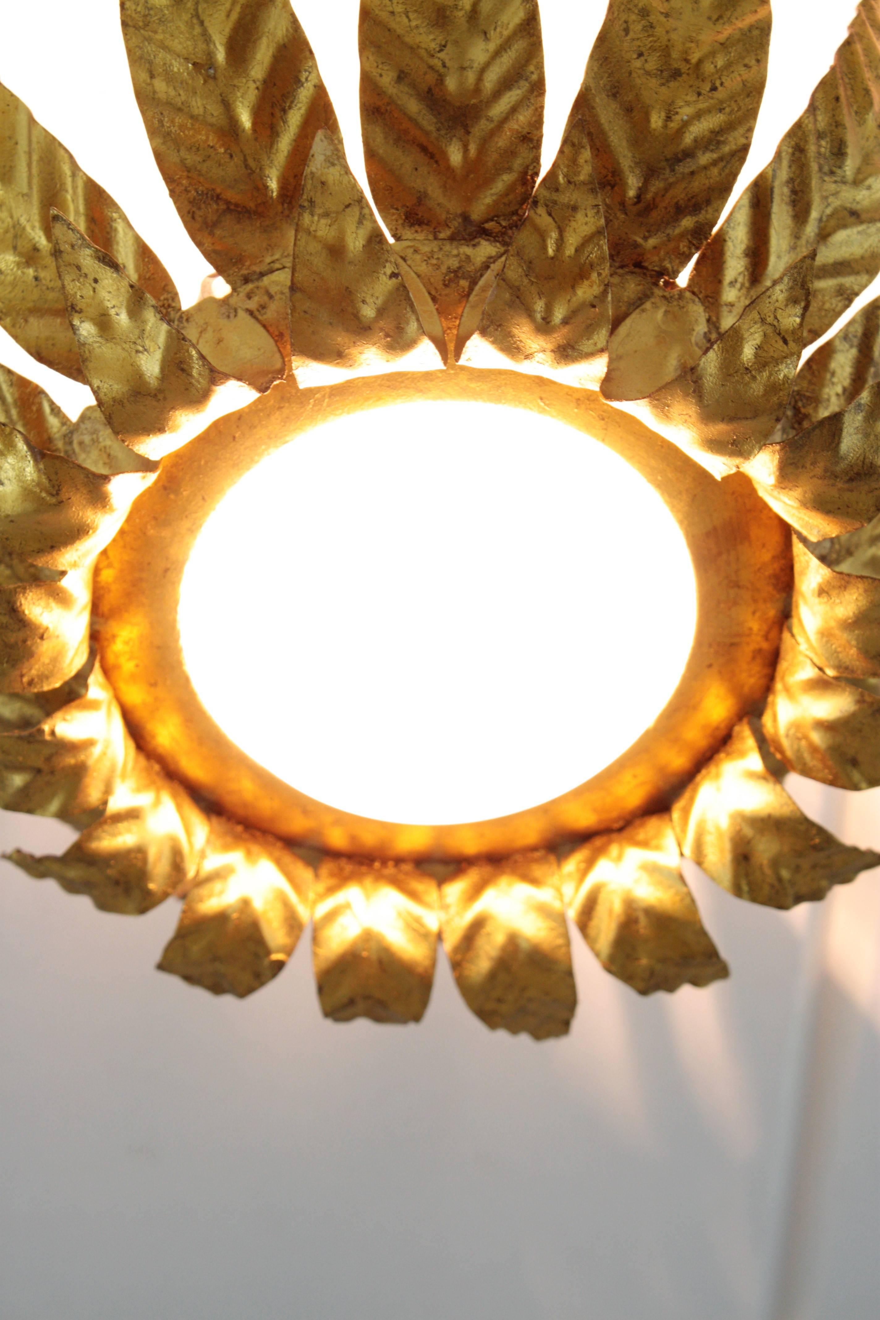 Sunburst Light Fixture in Gold Leaf Gilt Iron and Milk Glass For Sale 3