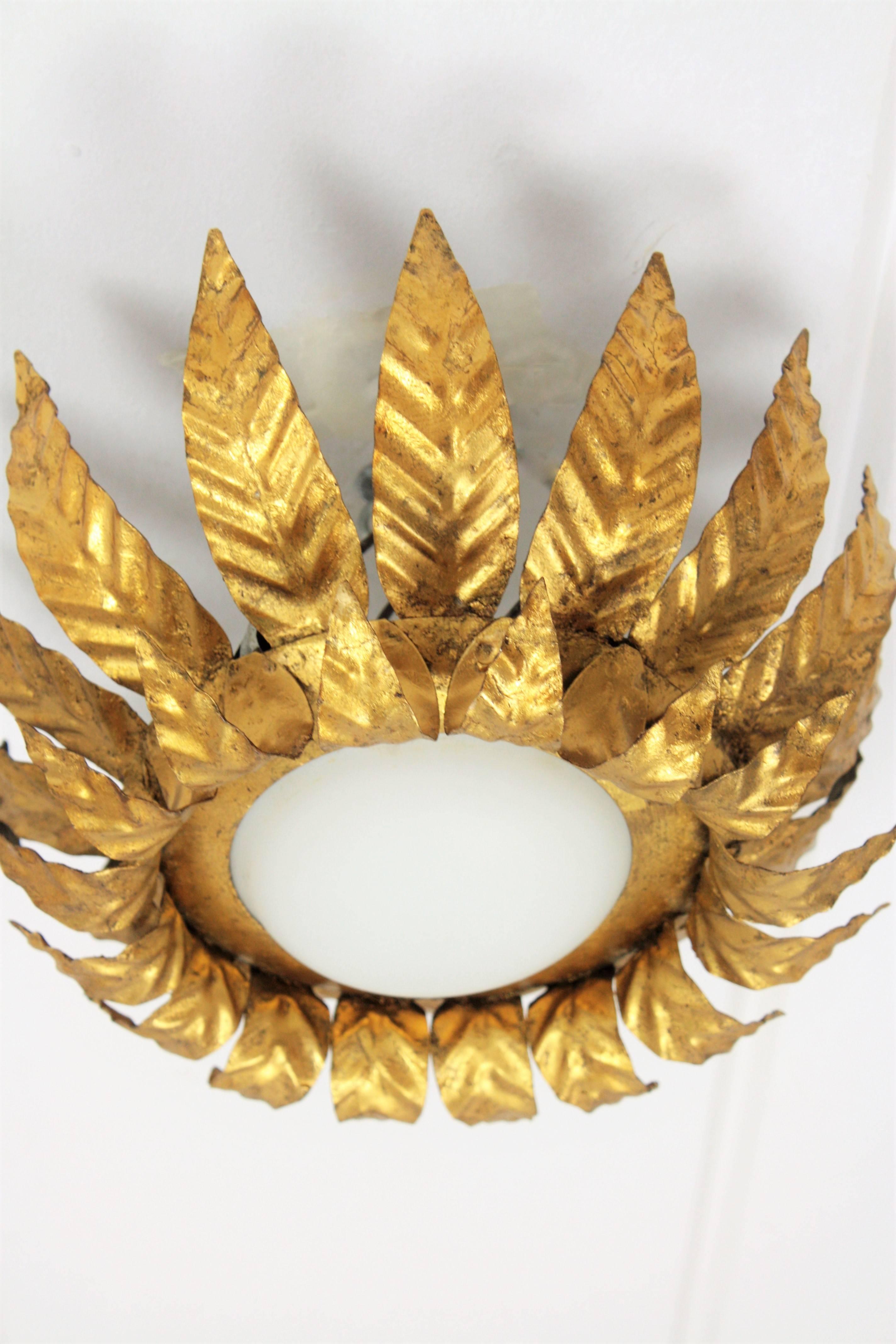Metal Sunburst Light Fixture in Gold Leaf Gilt Iron and Milk Glass For Sale