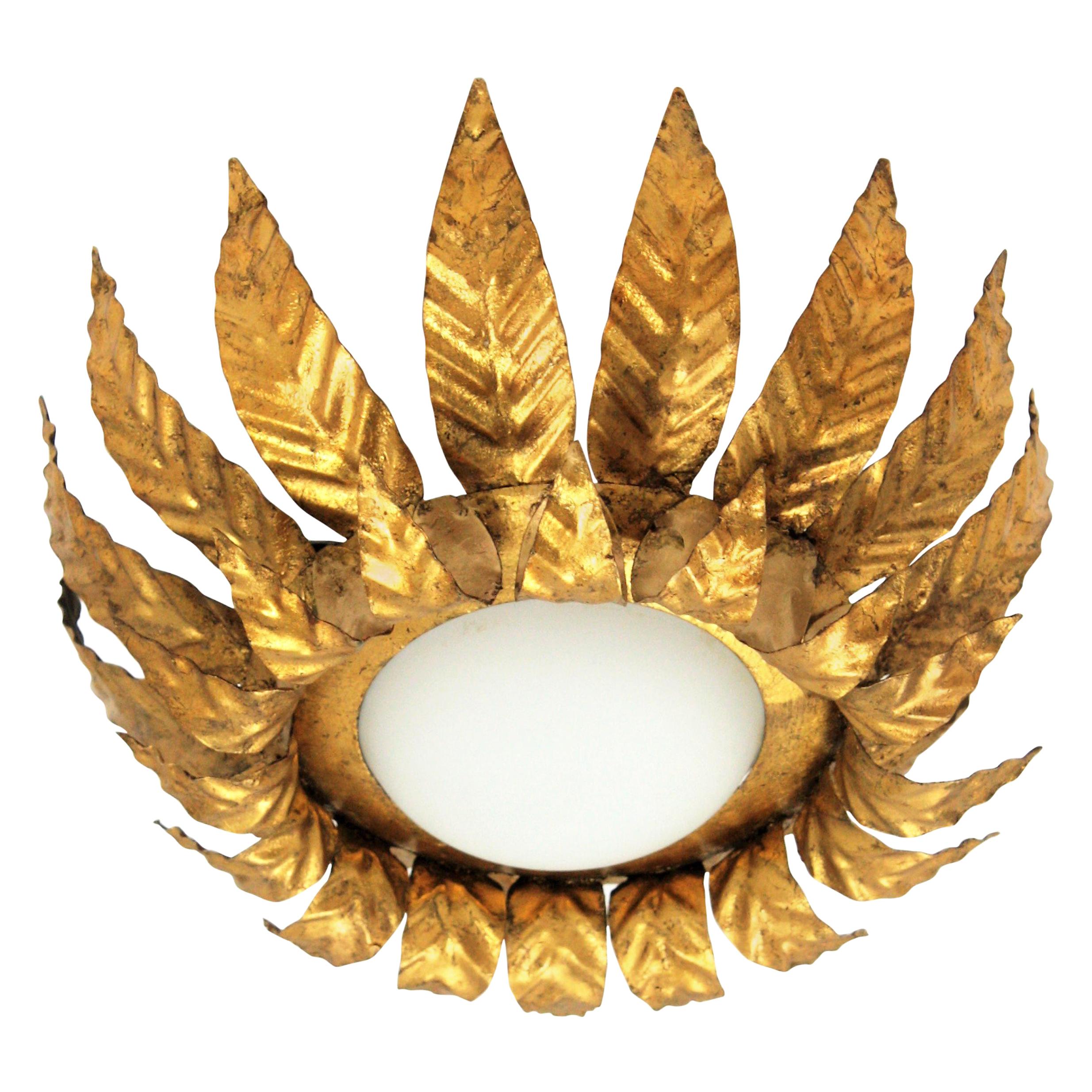 Sunburst Light Fixture in Gold Leaf Gilt Iron and Milk Glass For Sale