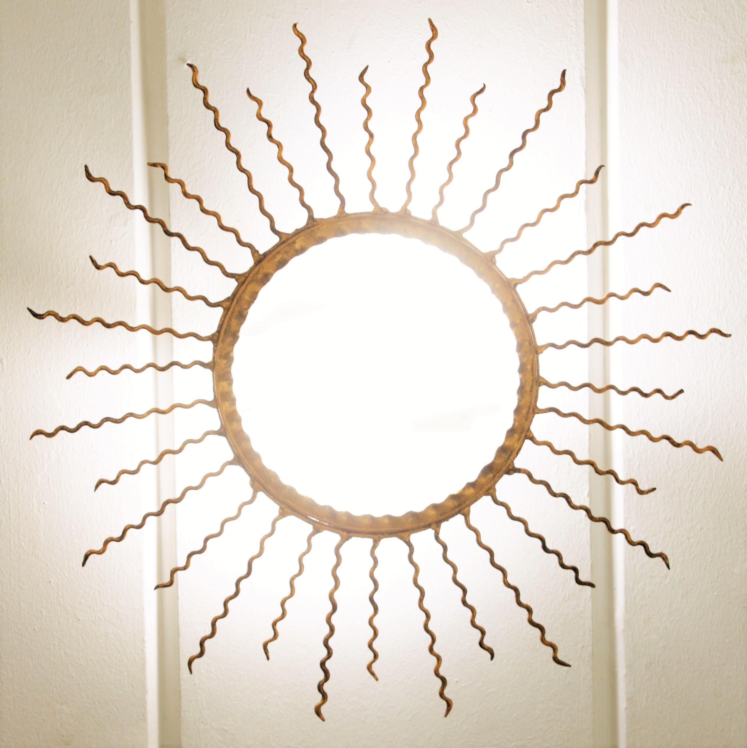 Sunburst Light Fixture or Sunburst Mirror in Gilt Iron, 1950s 6