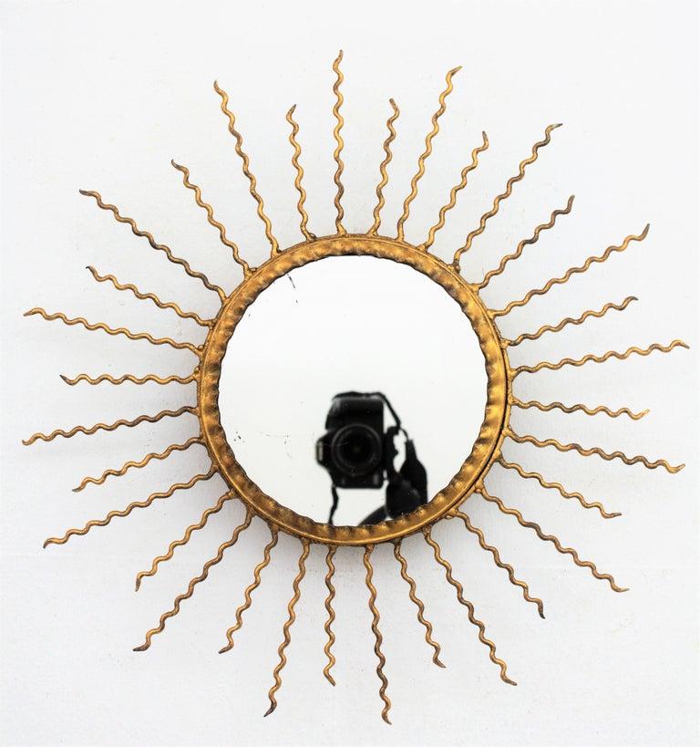 Sunburst Light Fixture or Sunburst Mirror in Gilt Iron, 1950s 7