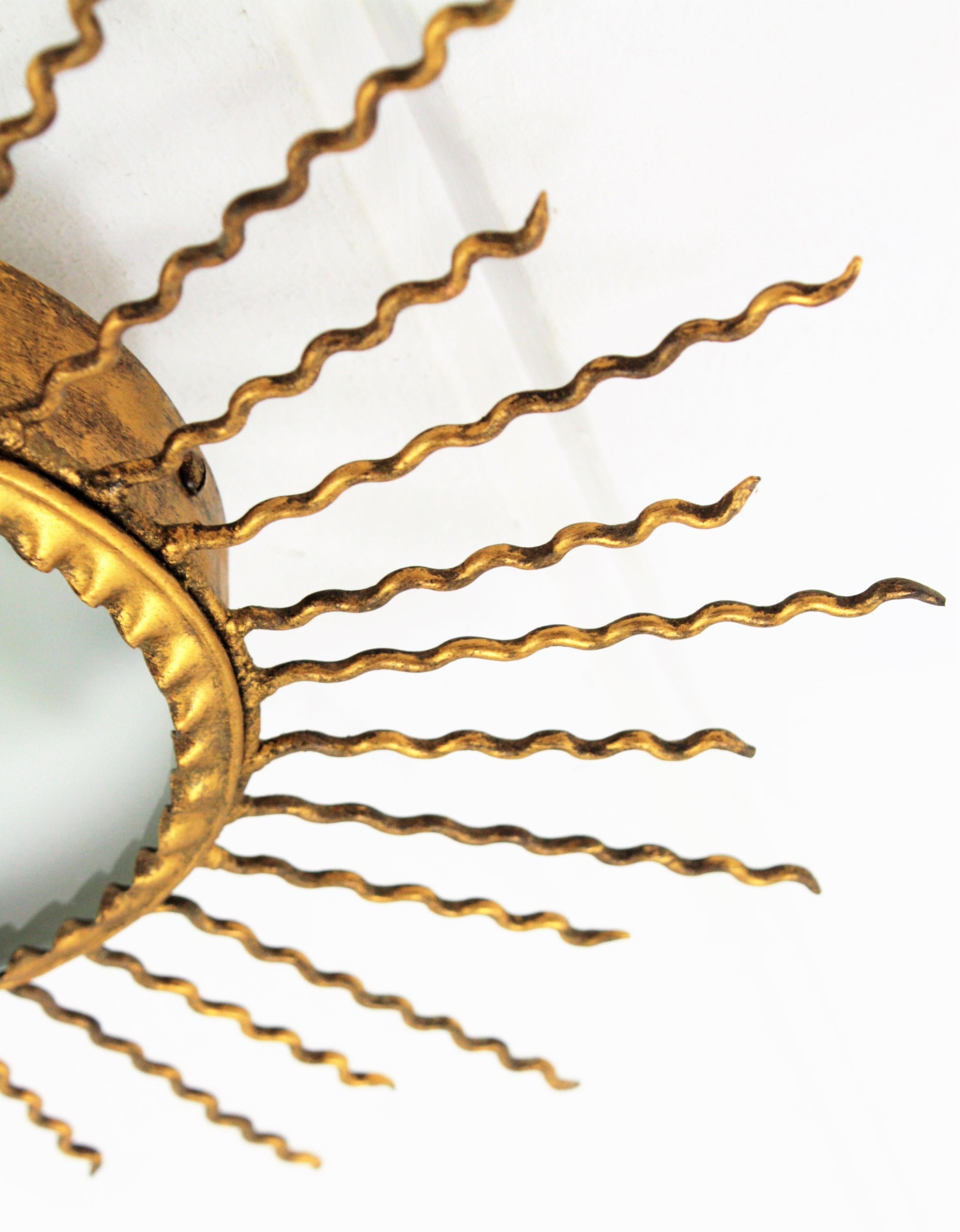 Sunburst Light Fixture or Sunburst Mirror in Gilt Iron, 1950s 8