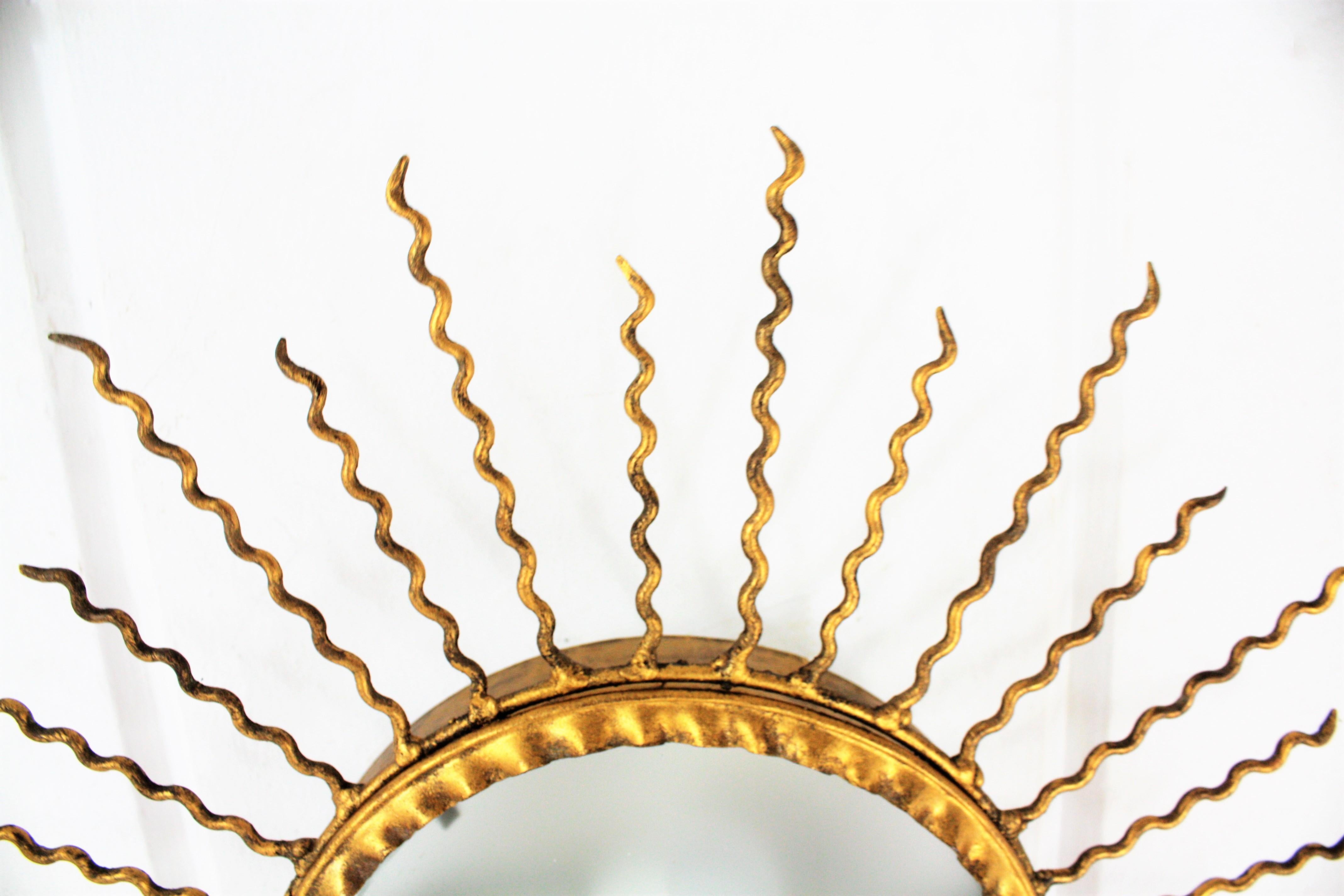 Sunburst Light Fixture or Sunburst Mirror in Gilt Iron, 1950s 9