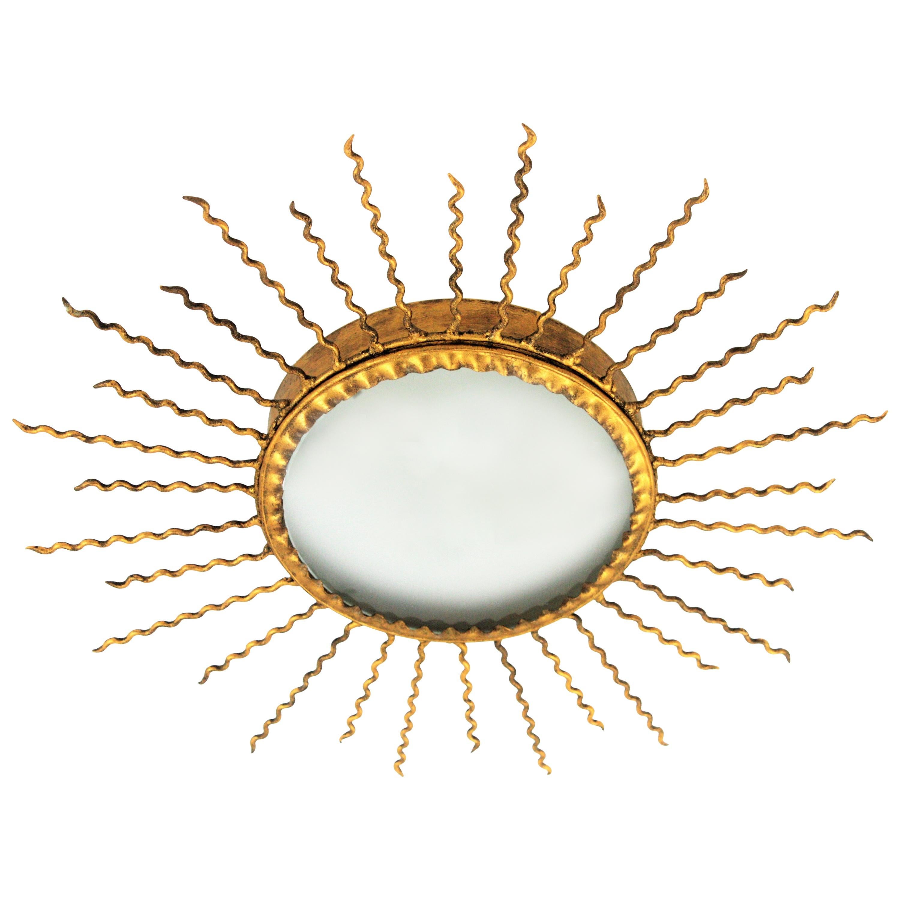 Mid-Century Modern Sunburst Light Fixture or Sunburst Mirror in Gilt Iron, 1950s