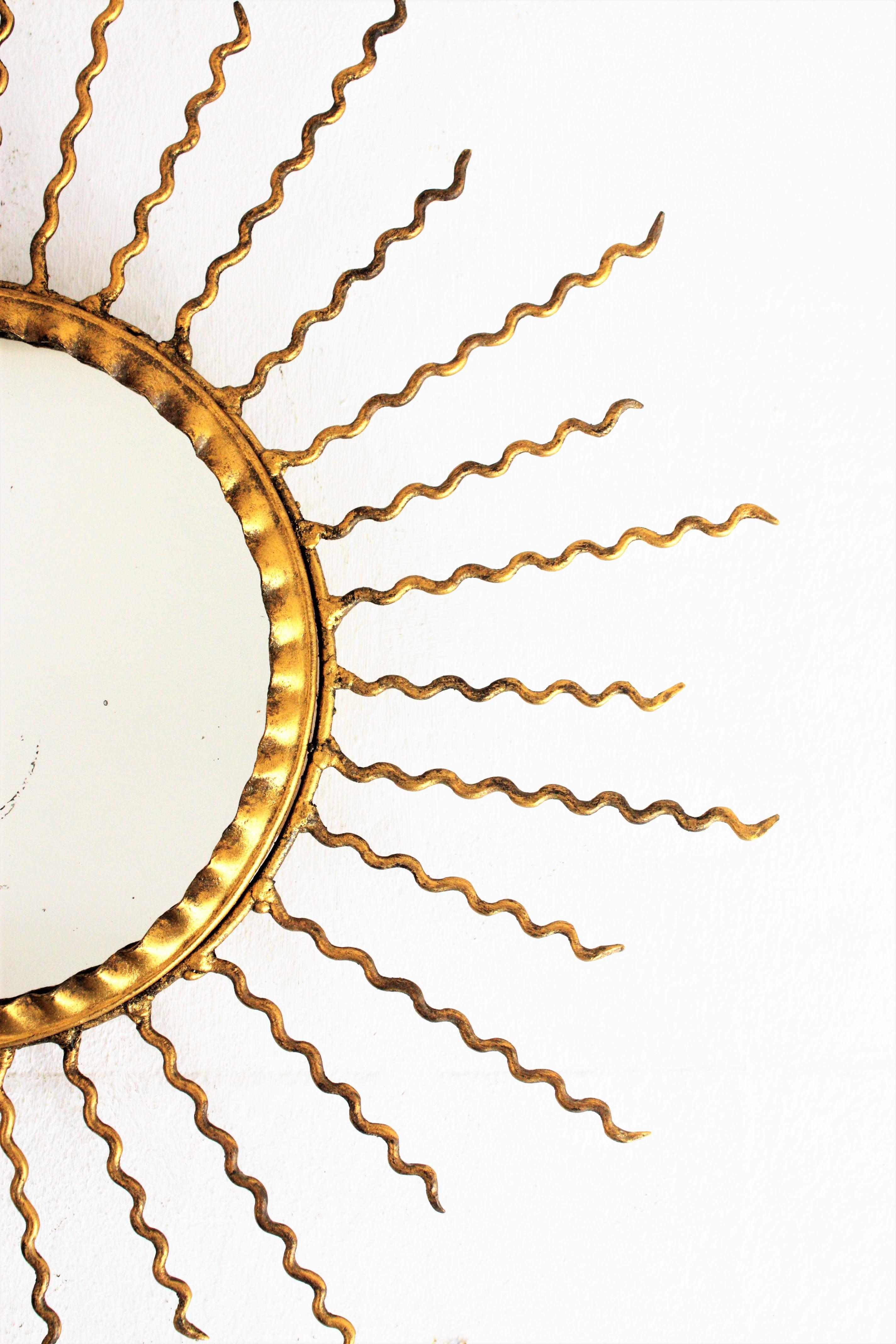 Sunburst Light Fixture or Sunburst Mirror in Gilt Iron, 1950s In Good Condition In Barcelona, ES
