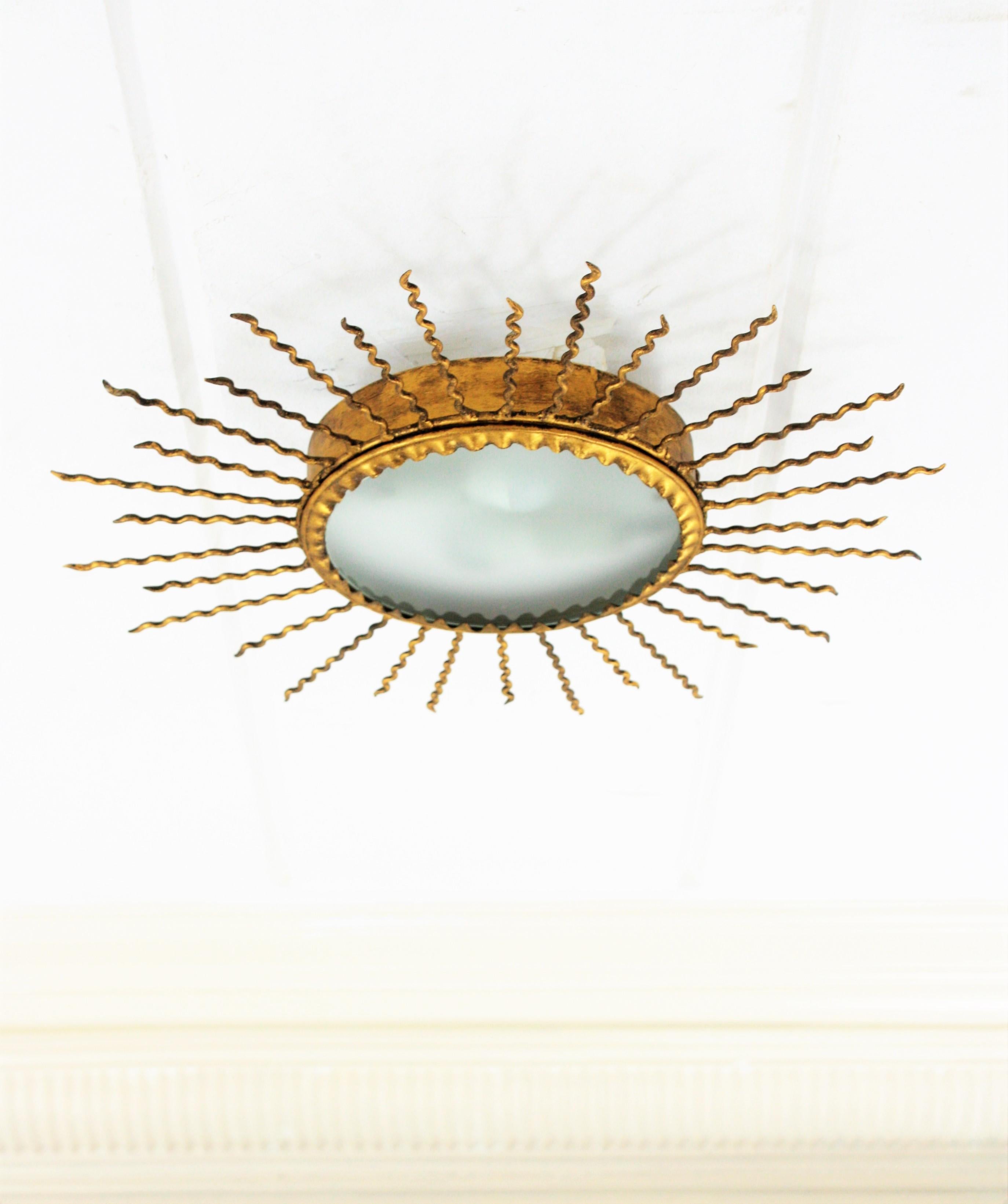20th Century Sunburst Light Fixture or Sunburst Mirror in Gilt Iron, 1950s