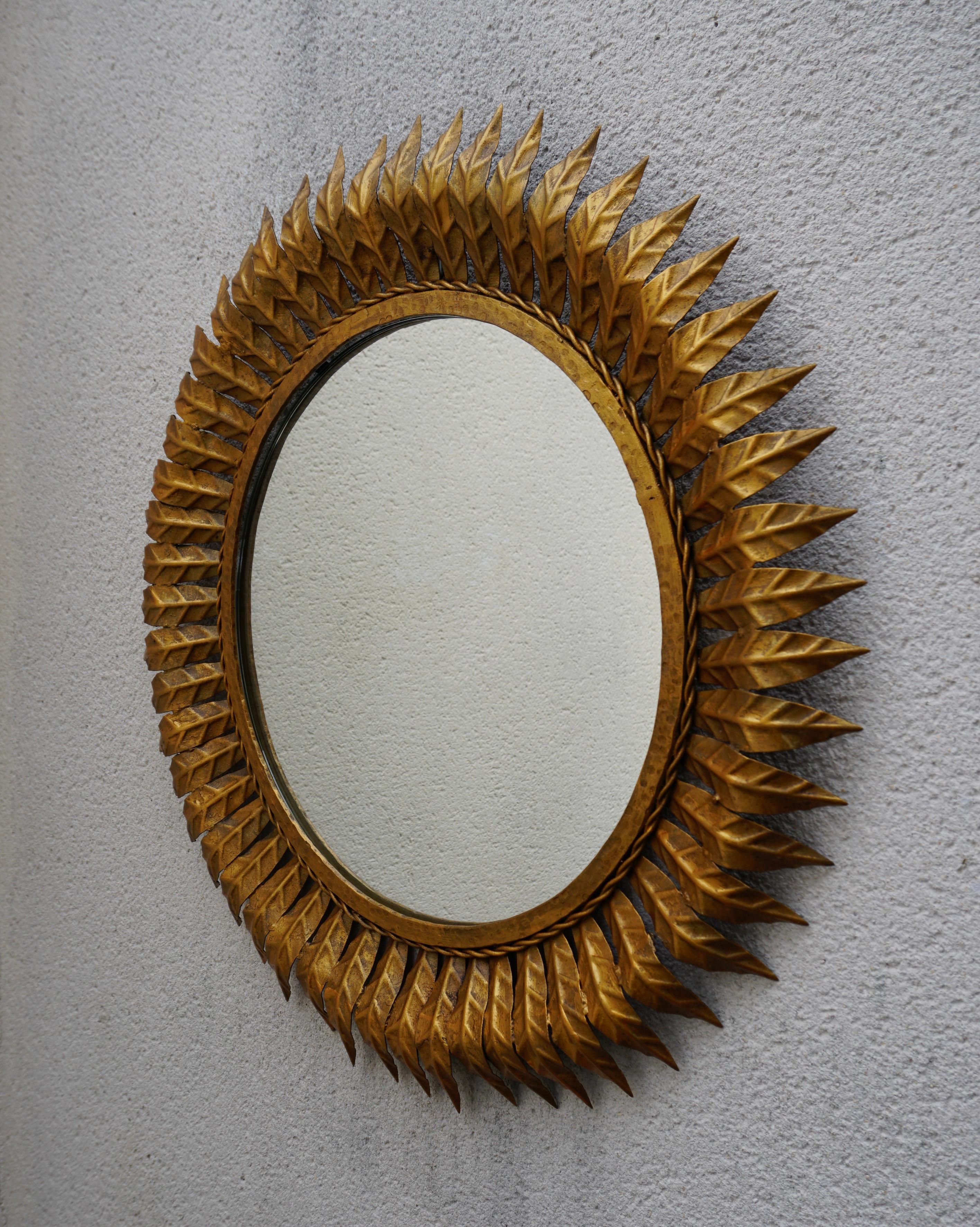 A striking vintage mirror in Regency style. The mirror is 24